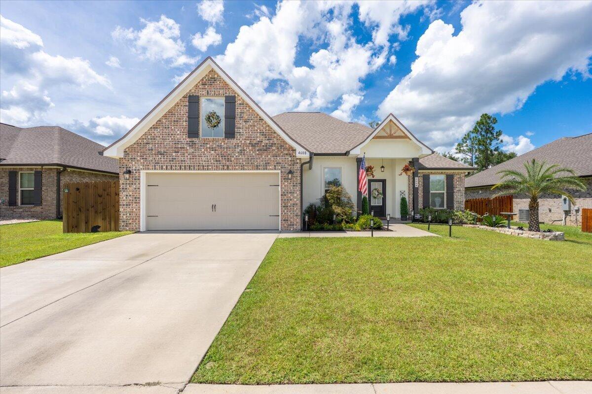 Welcome home to this beautifully upgraded 3-bedroom home with a versatile flex room that can easily serve as a home office, playroom, or potential 4th bedroom. Inside, you'll find wood-look tile flooring throughout, quartz countertops, a spacious walk-in pantry, and a built-in desk/niche with a lighted mirror. The primary suite features a tray ceiling, TWO walk-in closets, and a spacious bathroom with a garden tub and separate shower.

The sellers have taken this home to the next level with thoughtful upgrades inside and out! French doors have been added to the flex room for added privacy, while the screened-in back porch and wooden deck create the perfect setup for relaxing, grilling, or entertaining. A sprinkler system makes lawn care a breeze.

And don't overlook the garage--it's been transformed into the ultimate bonus hangout space with a dedicated mini-split A/C system, epoxy floors, pull down screen door, and additional lighting. Whether you envision a man cave, home gym, workshop, game room, or simply a comfortable climate-controlled garage, the possibilities are endless!

With flexible living spaces, plenty of storage, and upgrades designed for both comfort and entertaining, this South Crestview home is ready for its next owners!