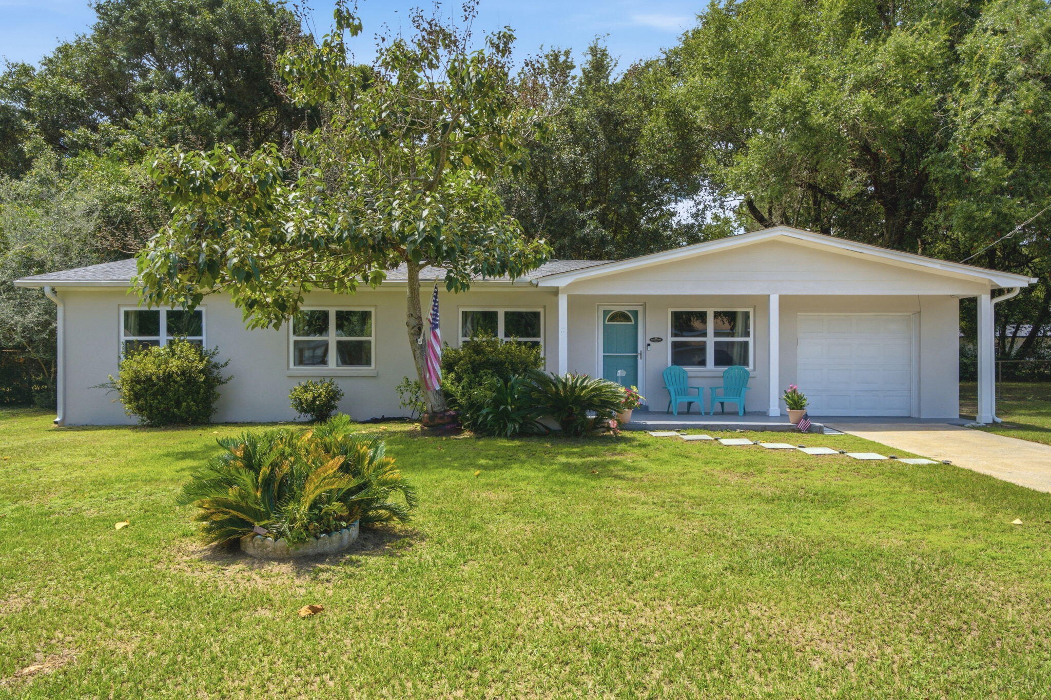 Welcome to this beautifully renovated single-story ranch home nestled in Pensacola's established Mayfair neighborhood! Featuring 3 bedrooms, 2 full bathrooms, an attached 1-car garage, and nearly 1,300 square feet of thoughtful living space, this turnkey home offers modern updates and low-maintenance living on a generous 0.30-acre lot. With recent seller upgrades including a new storm door, new garage door opener, new ceiling fans, new privacy fencing on both sides of the house, and newly installed rain gutters. Step inside to an inviting open-concept layout highlighted by light neutral-colored paint, durable luxury vinyl plank flooring, and abundant natural light. The updated kitchen offers sleek cabinetry, updated appliances, and opens directly into the main living and dining areas - ideal for daily life and entertaining guests. Both full bathrooms have been refreshed with custom tiled showers and modern fixtures. Enjoy added peace of mind with a 2023 Roof and HVAC system! Best of all is the exceptionally convenient central Pensacola location! Commuters will love being just 10 minutes from Naval Hospital Pensacola, 12 to 15 minutes from Corry Station and NAS Pensacola, and 10 minutes from the historic dining and nightlife of Downtown Pensacola. Pensacola International Airport (PNS) is only 15 minutes away, and the sugary white sands of Pensacola Beach are just a short 25-minute drive. Whether you're a military family looking for a smooth commute or a homebuyer seeking move- in-ready comfort near everything the Gulf Coast has to offer, this home is a must-see
