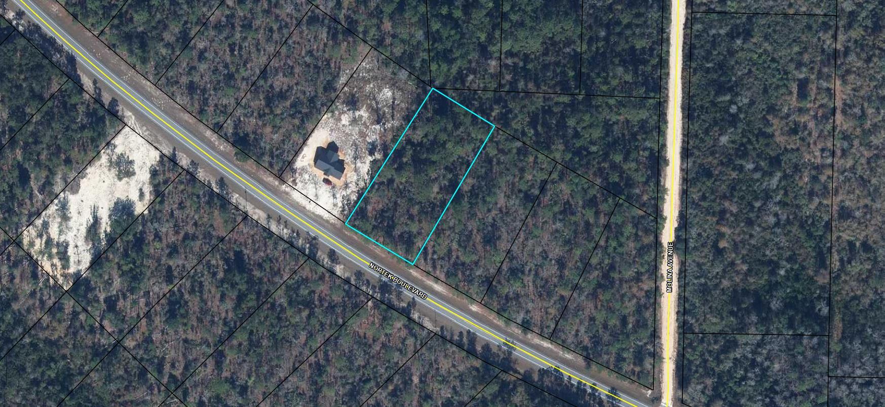Large 1.181 acre lot in Compass Lake in the Hills. There is a voluntary HOA of $135 a year, but what a great price for all the amenities that are included such as: access to 2 lakes for fishing, tennis, horse stables / riding, rental cabins, RV spots, boat rentals, clubhouse, and a golf range. Being an all-sports lake, enjoy water skiing, tubing, jet skiing, boating, sailing, kayaking & swimming. No need to worry about lunch while out on the water when you have a boat accessible shoreline restaurant. This location is great for someone who enjoys nature and a short drive to the beach since it is located half way between Panama City And Dothan. The area is rich in historical significance, with many restored antebellum plantation homes open for tours or as bed-and-breakfast