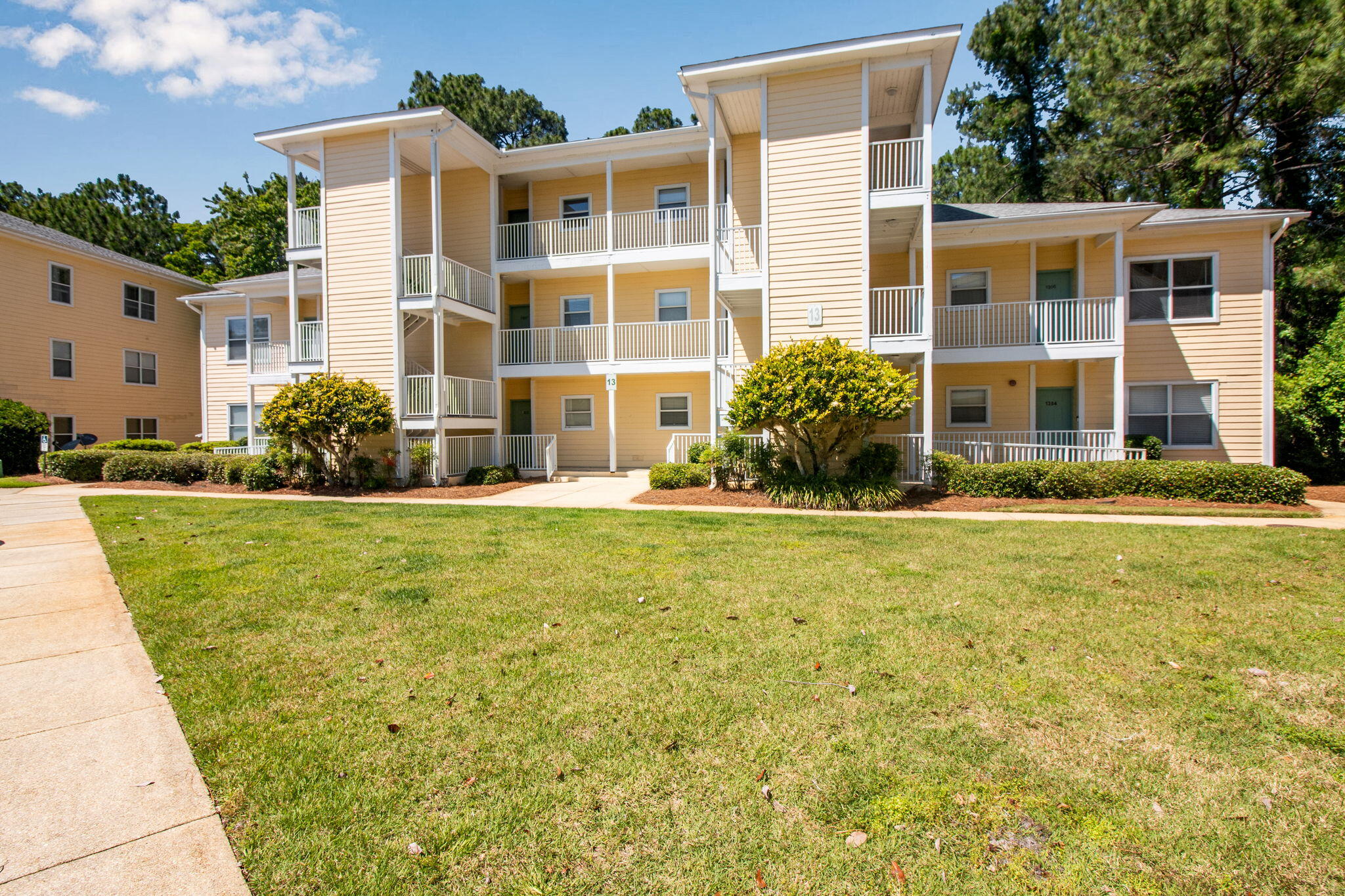 Retreat to Point of View in Sandestin. This lovely two bedroom condo for rent in Sandestin offers a great open floor plan, spacious balcony and convenient location. Enjoy not being far to Sacred Heart Hospital, Grand Boulevard and just a short car ride across Highway 98 away from the beautiful beaches of South Walton. The condo itself has been recently painted in a neutral colors that help to create a warm and inviting atmosphere from the moment you enter. The kitchen, living and dining areas are lined with easy-to-clean tile floors and the back deck faces a secluded wooded area. Condo comes with all major appliances, including a washer/dryer as is. We are sorry this rental is not pet-friendly and does not permit smoking.