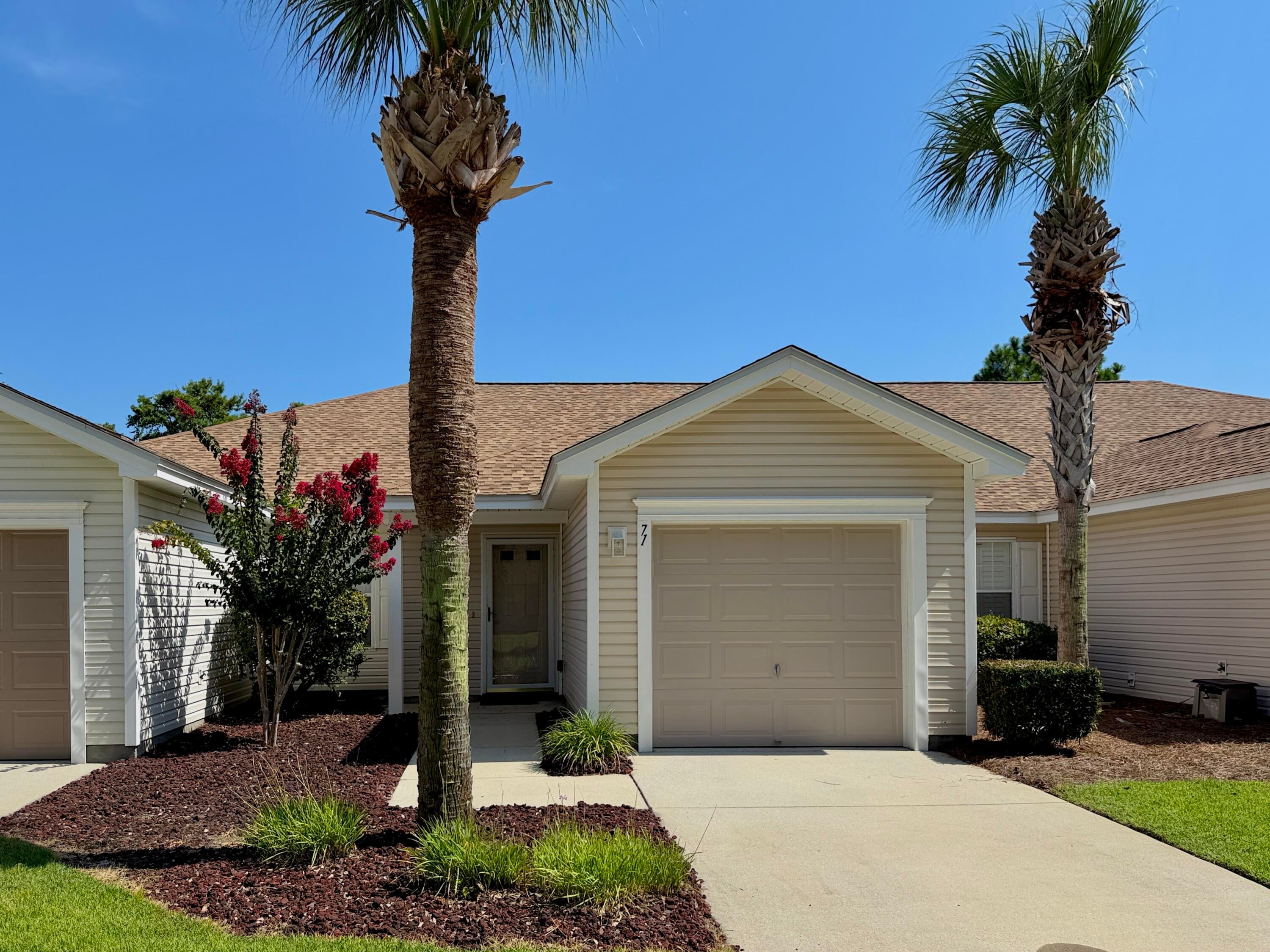 Beautiful Palmetto Trace Subdivision, with its gorgeous tree-lined streets, two community pools and sidewalks throughout, is dog-friendly, golf cart-friendly and sits in the perfect location, minutes to Pier Park's many shops & restaurants, and the world's most beautiful beaches! This 2 bed/2 bath townhome is extremely clean, and move-in ready. Inside you will find an open floor plan all on one level with a huge amount of living space to include oversized living & dining areas with vaulted ceiling, open kitchen w/breakfast area and breakfast bar, large master bedroom with 2 large closets, laundry closet with stacked washer/dryer, and ample storage space. Additional highlights include a one car garage, private screened-in porch, unique extended patio and garden area with views of trees, lake, and the adorable ducks that occupy it. Updates include roof 2023, HVAC 2021, water heater 2022, and new garage door opening system with remote 2025. Home also includes metal hurricane shutters with all the hardware. It's rare to find an established neighborhood with low HOA fees. $173/mo covers lawn and landscaping maintenance, lawn irrigation, palm tree trimming, trash service, pools, and an exterior pressure wash 1x/yr, so be sure to compare! 

Palmetto Trace is 14 miles from PCB International Airport, 5 minutes to shopping, restaurants & entertainment at Pier Park, and just over a mile to Gayle's Trails walking trails, Frank Brown park and PCB's 3,000 acre conservation park. From Palmetto Trace, street legal vehicles are allowed to cross Hwy 98 traveling North & South on Pier Park Drive. Call to schedule your private showing. All information is approximate & should be verified by buyer if important.
