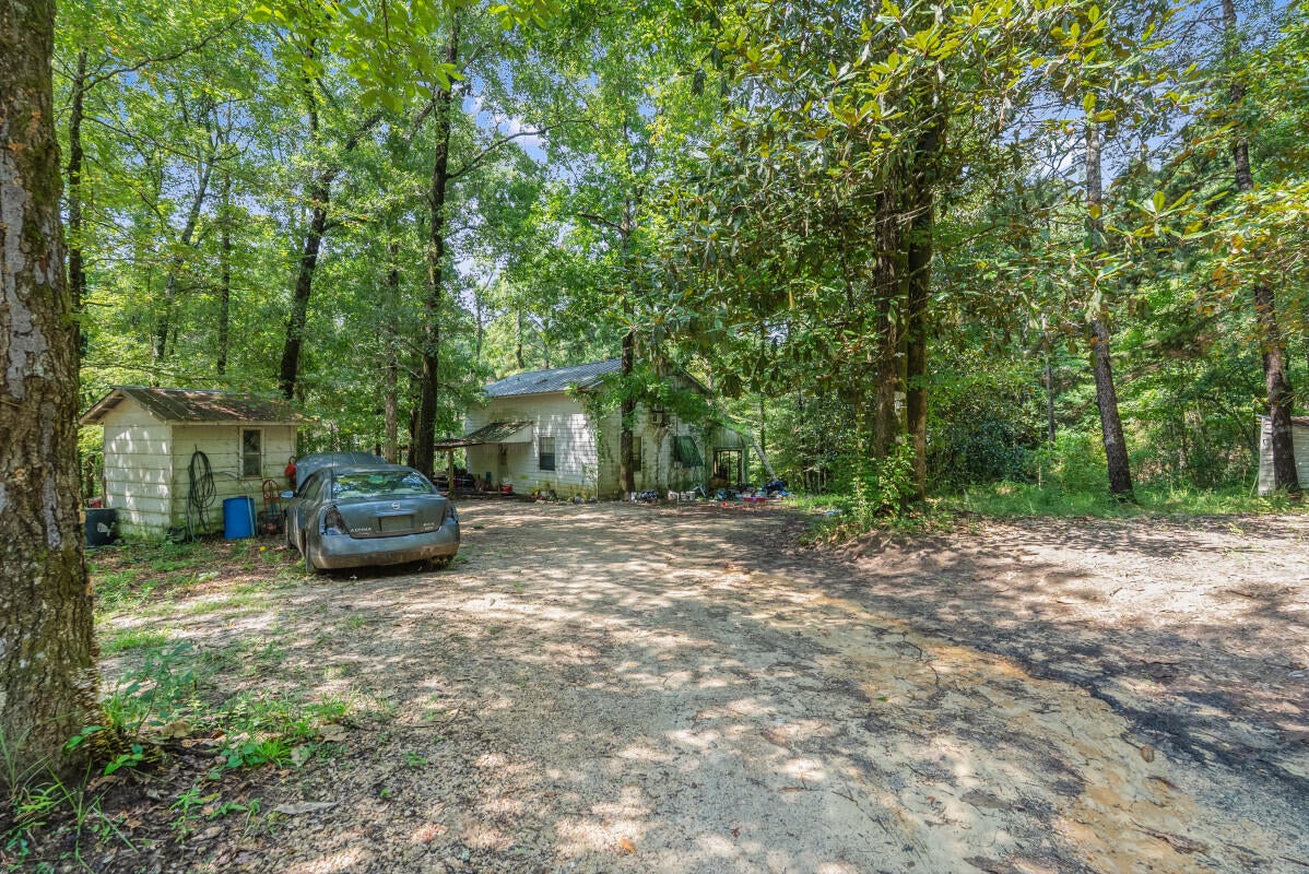 10 ACRE LOT! This spacious 2-story home offers a unique value-add opportunity with a flexible floor plan featuring multiple living areas, generously sized bedrooms, and a large upstairs family room that provides additional living or recreation space. The home has solid potential for a full renovation, making it ideal for fix-and-flip investors, buy-and-hold landlords, or those looking to maximize equity through improvements. With its sizeable layout and location in DeFuniak Springs, this property presents an excellent opportunity to create a highly desirable residence while adding significant value.
Repairs include interior paint, drywall repair, flooring replacement or refinishing, bathroom updates, kitchen renovation, trim and door repairs, and replacement of damaged fixtures throughout.