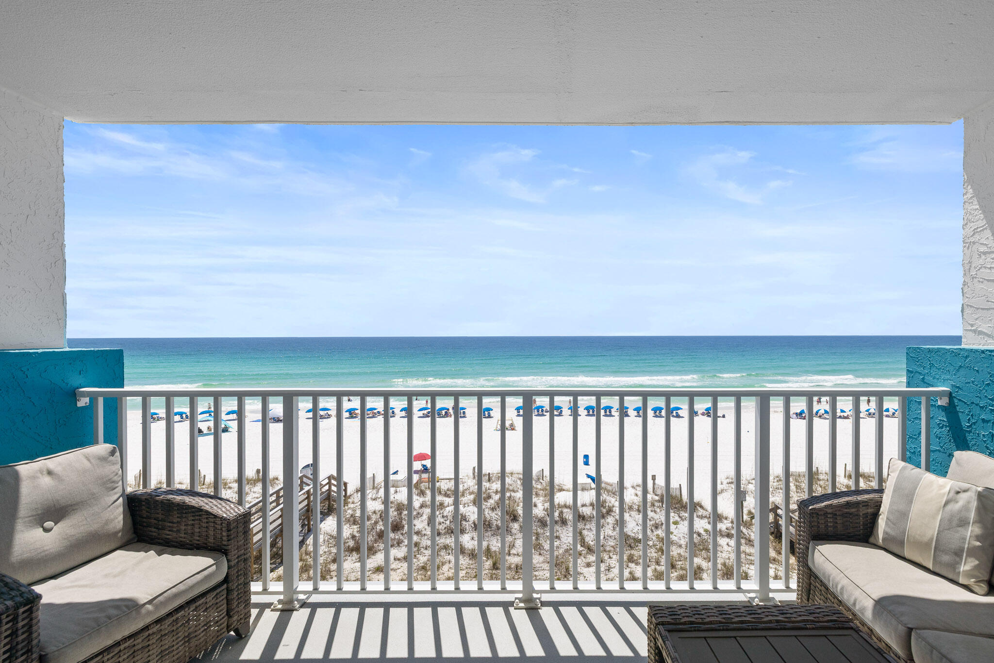 Welcome to effortless gulf front living at this beautifully renovated 1 bedroom, 2 bath condo perfectly positioned directly gulfront in a low density complex on Okaloosa Island in Fort Walton Beach with a ROOF TOP pool! Whether you're searching for a turnkey vacation rental, second home, or personal beachfront escape, this fully furnished condo offers the ideal blend of style, comfort, and coastal charm. Inside, the unit has been extensively updated with luxury vinyl plank flooring throughout, smooth refinished ceilings, fresh interior paint, all new furnishings and decor, updated lighting, and a completely reconfigured kitchen featuring new cabinetry, quartz countertops, stainless appliances, and an updated sink and faucet. Both bathrooms have been thoughtfully renovated with new cabinetry, quartz counters, updated mirrors and lighting, while the guest bath now features a beautifully tiled walk-in shower with glass enclosure. New storm windows add additional value, and the interior laundry room is a convenient amenity for owners and guests alike. The spacious open living area is designed to maximize the stunning unobstructed Gulf views, while the oversized bedroom and queen sleeper sofa allow the condo to comfortably sleep four guests. Step outside and enjoy the best view on Okaloosa Island from the community's beautifully renovated rooftop pool, or relax on your private balcony with updated patio furniture and new balcony railings. Recent exterior and community improvements include exterior repainting, rooftop pool renovations, new roof, updated balcony handrails, and storm windows. Currently a professionally managed and well-performing vacation rental. HOA fees include water, sewer, trash, internet, and amenities.