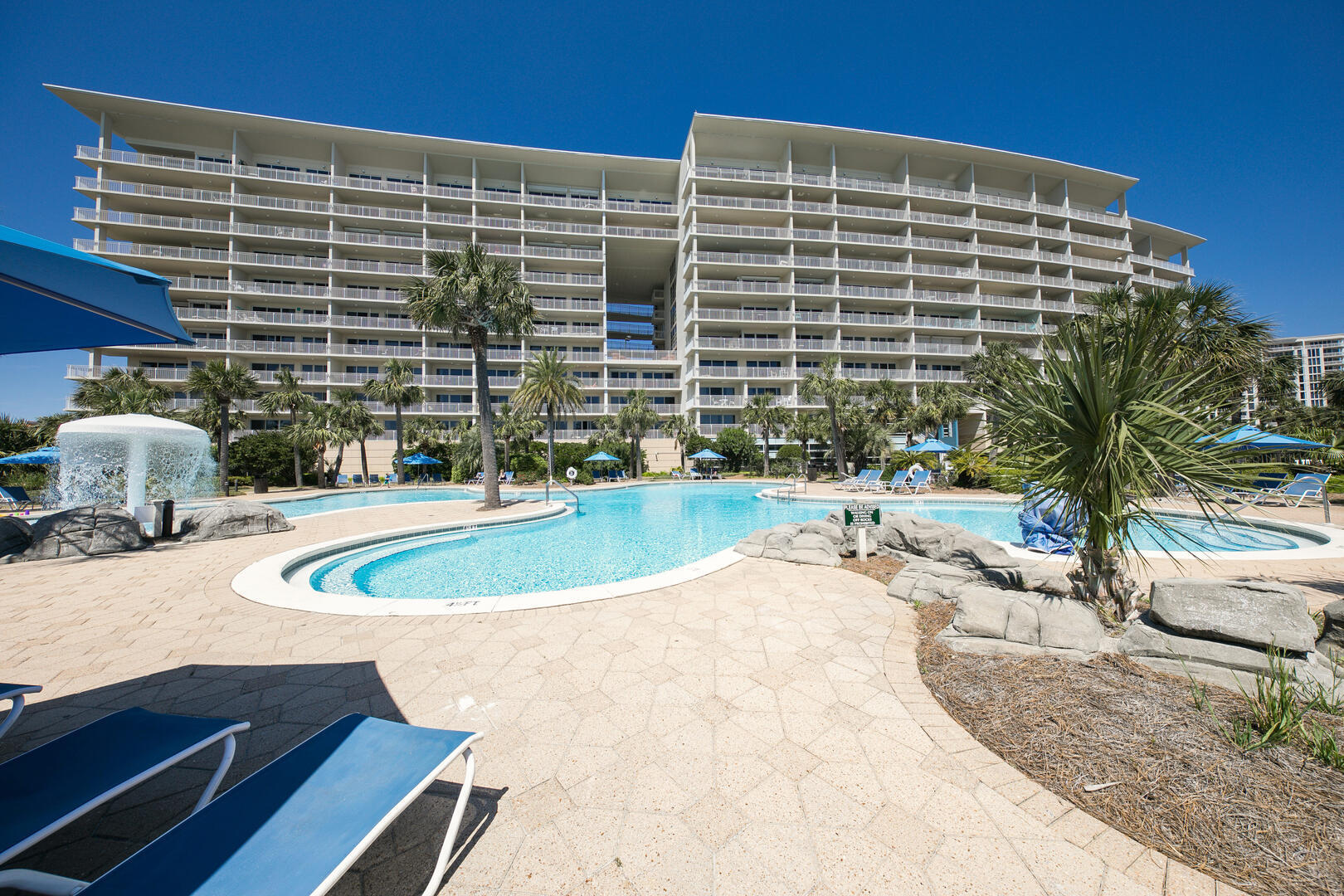 This spacious two-bedroom, two-bath condo in Destin's Sterling Shores Resort offers breathtaking Gulf views from its oversized balcony. The open-concept living space includes a spacious dining area with seating for six and a kitchen with stainless steel appliances, wood cabinets, and a high-top breakfast bar, perfect for casual meals. The living room invites relaxation with soft sea breezes from the sliding glass doors, while the extended balcony offers a great spot for alfresco dining with views of the resort pool and the shimmering Gulf.

The master bedroom features stunning views and a calm, neutral decor, while the en-suite bathroom boasts a walk-in shower and a separate garden tub. The second bedroom, with twin beds and a generous closet, is perfect for guests or family members. There's an additional guest bathroom with a tub/shower combo, and a laundry closet with a full-sized washer and dryer for added convenience.

Just a short stroll to the pristine white sand beach, this condo offers access to a lagoon pool, fitness center, bar, grill, and private beach club with rental services. The resort also features a surround-sound movie theater, BBQ grills, and picnic areas. Located near restaurants, shops, golf courses, and Henderson Beach State Park, it's the ideal spot for relaxation or adventure. With on-site rental management, this well-maintained property is a perfect vacation home or rental income opportunity in a highly sought-after beachfront location.