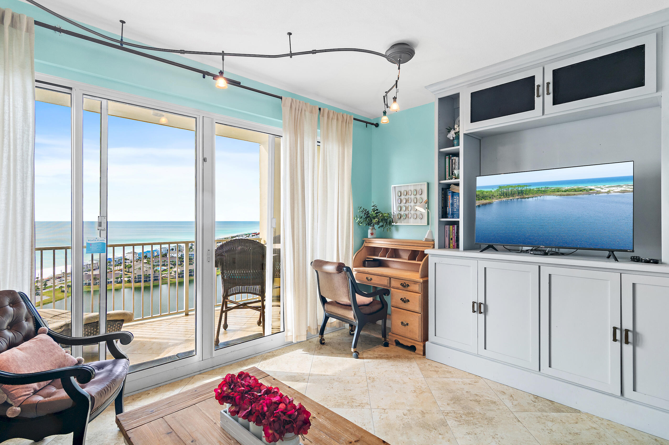 Experience elevated coastal living at 122 Seascape Blvd, Unit 2205 -- a refined retreat within Ariel Dunes II at Seascape Beach Resort. This fully furnished 1- bedroom, 1.5-bath condo blends comfort with breathtaking views, offering the ideal escape for beach lovers. From the spacious private balcony, take in panoramic views of the Gulf, Stewart Lake and spectacular sunsets that paint the sky each evening. Inside, the open-concept layout is designed for both relaxation and entertaining, with stylish furnishings and a bright, inviting atmosphere. Ariel Dunes II provides resort style amenities, including three expansive pools, a state-of-the-art fitness center, the popular Cabana Café, and a large grilling area perfect for gatherings. Owners and guests also enjoy full access to the unparalleled offerings of Seascape Resort with two additional pools, multiple tennis and pickleball courts, a golf course and deeded beach access. Whether you're seeking a primary residence, a refined second home, or a strong investment property, this condo places you at the heart of Miramar Beach's premier coastal destination!
