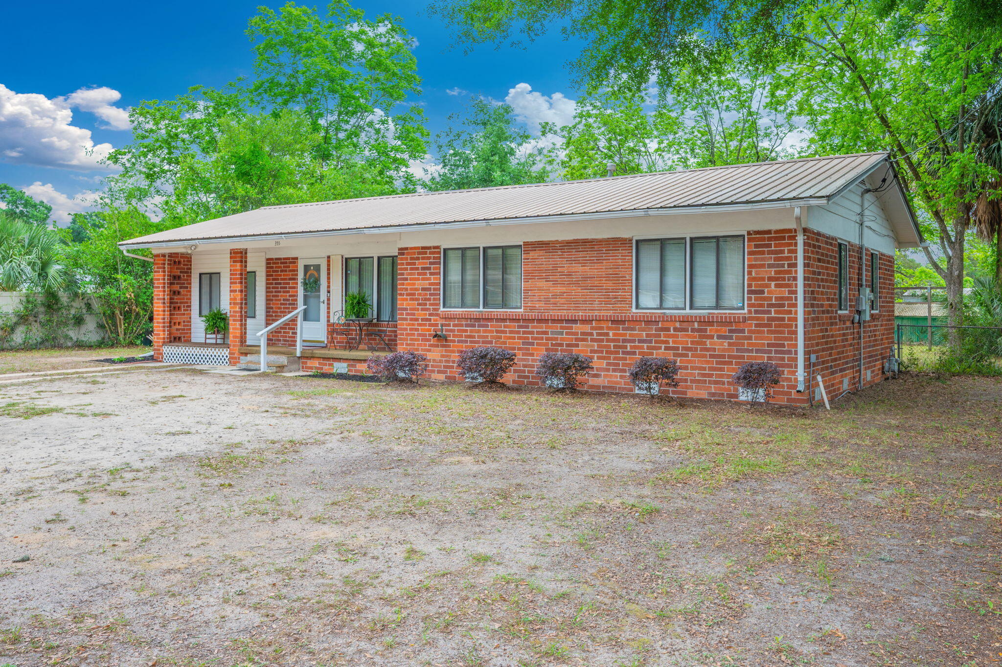 Investor Opportunity in the Heart of Crestview! Situated on a generous 3/4 acre lot, this  home offers space, flexibility, and strong potential for the right buyer. Being sold as-is, the seller has priced the property with consideration for the age of the home's major components--making this an ideal option for cash buyers or investors looking to add to their portfolio. Inside, you'll find a move-in ready layout suitable for a tenant, featuring both a living room and a spacious 18x13 family room--perfect for a second living area, home office, or craft space. There's also a cozy Florida Room, ideal for curling up with a good book or enjoying a quiet retreat. Outdoors, the expansive lot provides room to spread out, garden, or expand, and includes a 4-inch deep well pump to support your gardening needs. The backyard is chain-link fenced, offering a defined space for pets or outdoor enjoyment. Conveniently located in central Crestview, this property offers easy access to shopping, schools, and historic downtown Crestview. Whether you're looking for a rental investment or a property with room to personalize over time, this one checks all the boxes for opportunity and value.