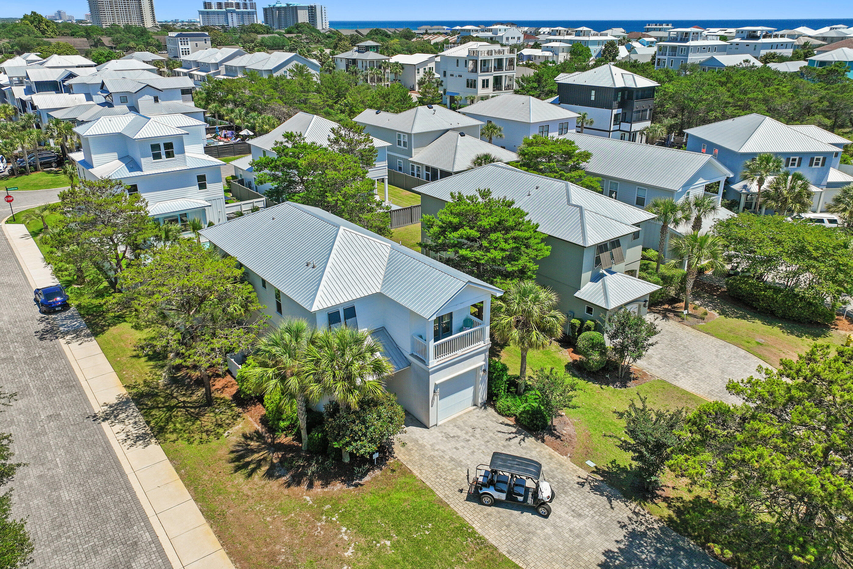 Situated on a large corner lot on the South end of sought-after gated community of Frangista Beach, 143 Penelope St is a fully furnished beach home and includes a 6 seat golf cart and a proven rental history as well! The main level of the home features a large and open living room with lots of seating, spacious luxury kitchen with granite counters stainless steel appliances, and a breakfast bar, dining area, as well as a guest room and full bathroom. The second level of the home features three more bedrooms including the primary one, all with their own private full bathrooms. The fenced-in back yard features a comfy back porch that is perfect for evening relaxation and grilling. The community pool is just short walk or golf cart ride away. The Villas of Frangista Beach is conveniently located in the heart of Miramar Beach and offers easy access to everything this area is known for. Ride your golf cart to the beach, Silver Sands Outlets, The Destin Commons, or any of the many beach front restaurants including Whale's Tale, Pompano Joe's, The Crab Trap, Surf Hut, and more!  This home makes for the perfect primary home, vacation home, or rental property. Come take a look! Buyer to please verify all information contained herein.