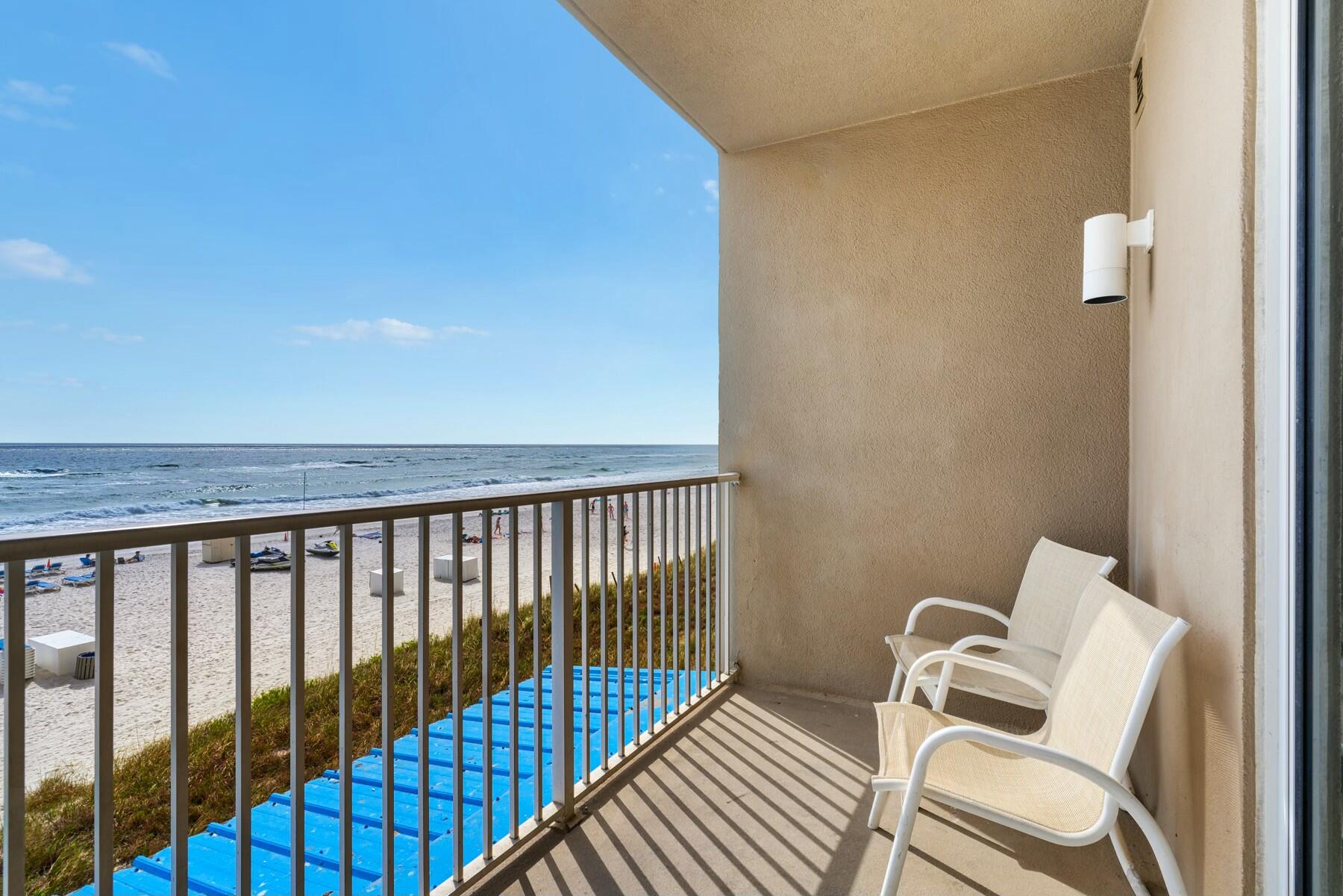 1/2 condo in Tidewater Beach , Panama City Beach. Direct Gulf front + 3 pools. Updated 2007.
This 1-bedroom, 2-bathroom condo in offers direct Gulf front access with unobstructed water views from your private balcony. The open floor plan maximizes 934 square feet with granite counters, tile flooring throughout, and a kitchen that flows into the living area. The primary suite features an en-suite bathroom and Gulf views. Built in 2007 with hurricane-rated construction, this unit includes central air conditioning and impact-resistant windows for Gulf Coast protection. The electrical and plumbing systems are original to construction with standard maintenance updates.The gated Tidewater Beach community features three pools including one indoor heated pool for year-round use, plus two exterior pools overlooking the Gulf. Additional amenities include a large exercise room, theater, game room, and conference center. Direct beach access, covered parking, and elevator-free entry to your unit.Located 5 minutes from Pier Park shopping and dining complex with restaurants, entertainment venues, and retail. Panama City Beach airport is 15 miles away. Strong rental income history for investment buyers. Schedule your showing today.