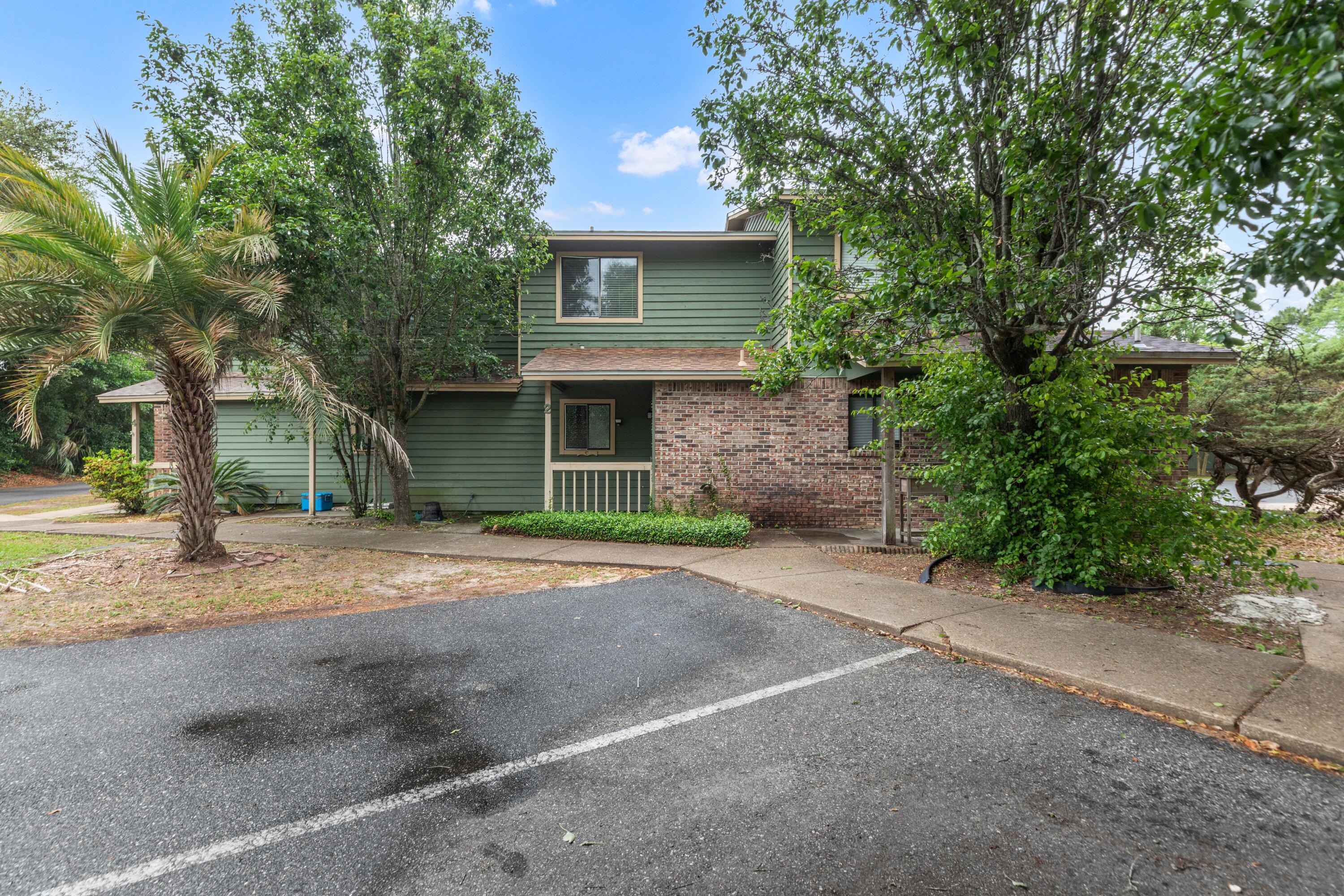 Welcome to this move-in ready townhome located at the end of the complex, offering added privacy and convenience. Freshly painted with brand-new flooring throughout, this home is ready for immediate occupancy. Enjoy access to the community pool and a prime location just across the street from shopping, dining, gyms, and everyday conveniences. A kids' playground is nearby, and you're only a couple of blocks from Ferry Park featuring pickleball courts, disc golf, walking trails, and more. Tenant is responsible for utilities. HOA maintains yard