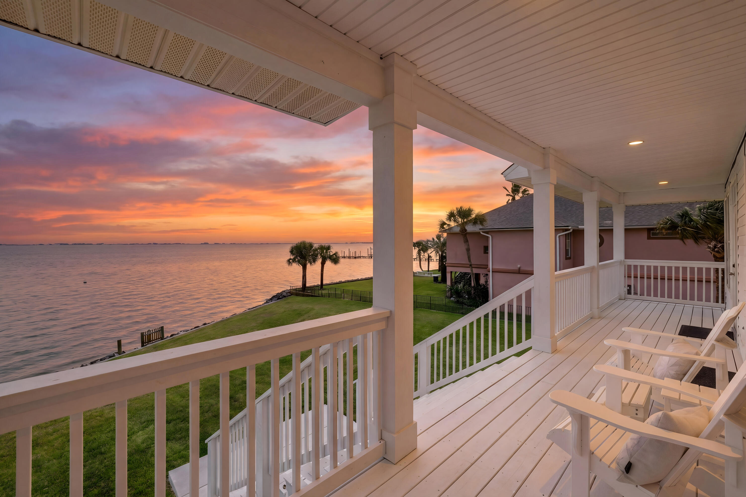 Back on the Market Due to No Fault of the Seller. Don't miss this true waterfront retreat a premier and highly desirable neighborhood, perfectly positioned on a private point with sweeping views of the Intracoastal Waterway and glimpses of the Gulf from nearly every room.

This updated 3-bedroom home offers the best of coastal living, combining privacy and serenity with convenient access to shopping, dining, white-sand beaches, and military bases.

The main living area is designed to capture the setting, with water views from nearly every angle, from the kitchen to the dining area to the living room, anchored by an electric fireplace, creating a bright, open space that keeps the water as the focal point.

Thoughtfully updated throughout, the fully remodeled kitchen features updated cabinetry, granite countertops, stainless steel appliances, and above and below cabinet lighting, all paired with modern finishes. New flooring, new carpet, updated baseboards, and smart switches throughout the home add a clean, modern feel.

The primary suite offers a true spa-like experience with a completely renovated bath featuring heated floors, a soaking tub with surrounding wainscoting, & a custom shower with five jetted shower heads. Bidet toilets have been added in the two full bathrooms for added comfort & convenience.

Upstairs, two lovely guest bedrooms share a well-designed bath with separate vanities & access to a veranda overlooking the water/views & feature additional storage tucked behind the closets.

The lower level leads to a spacious 2.5-car garage with water views and a large storage area. Outdoors, enjoy fishing and crabbing right from your backyard, rinse off in the outdoor shower, and take in daily visits from dolphins, rays, birds, and more, along with unforgettable sunrises and sunsets.

For boating enthusiasts, the property offers ample space to add a dock, making it easy to take full advantage of life on the water. The HOA also provides amenities such as a small neighborhood park and dock perfect for fishing or launching a paddle board or kayak.

Major system improvements provide peace of mind, including a 2020 roof, impact-resistant windows installed within the last eight years, and HVAC systems just 2 years old. Additional enhancements feature new sprinkler system and sod, new cement pads and walkways, updated stairs and railings, and a new hurricane-rated front door.

This is more than a home, it's a lifestyle. Waterfront properties in with this setting and level of updates are rarely available.