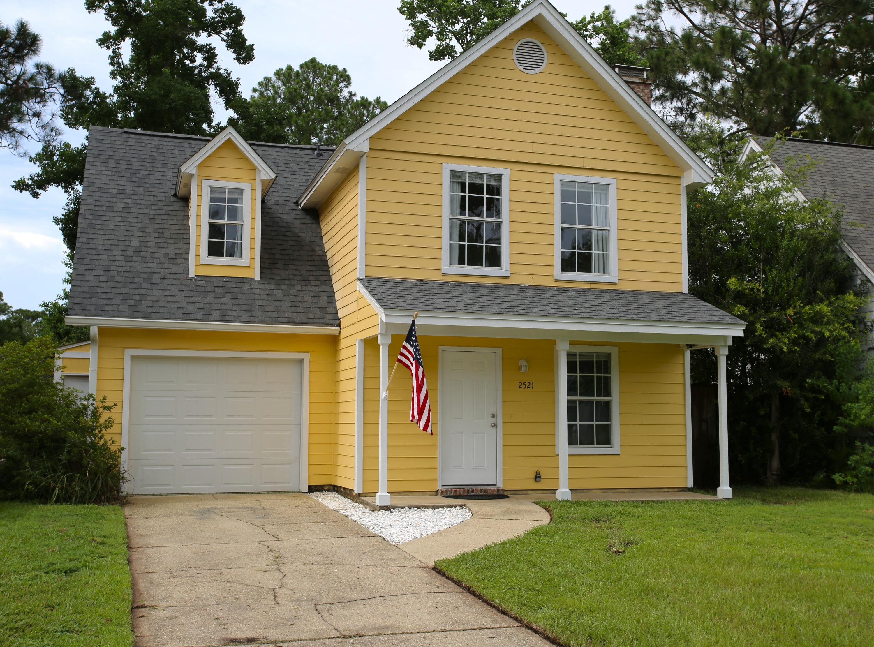 Welcome to 2521 Georgetown Lane in Fort Walton Beach! This beautifully updated two-story home is move-in ready, packed with upgrades. 

Step inside to find fresh paint throughout, a fully remodeled kitchen, and updated bathrooms that give the home a modern, refreshed feel. The spacious living area features durable tile flooring and a cozy fireplace, creating the perfect space for relaxing or entertaining family and friends.

Upstairs, you'll enjoy the comfort of brand-new carpet, while the home's layout offers plenty of flexibility with 2 full bathrooms and 1 convenient half bath. Major improvements have already been completed, including a new roof, providing peace of mind for years to come.

Additional features include a one-car garage, a detached storage unit for extra space and organization, and a functional two-story floor plan designed for comfortable everyday living.

Conveniently located in Fort Walton Beach, this updated home combines style, comfort, and value in one attractive package.