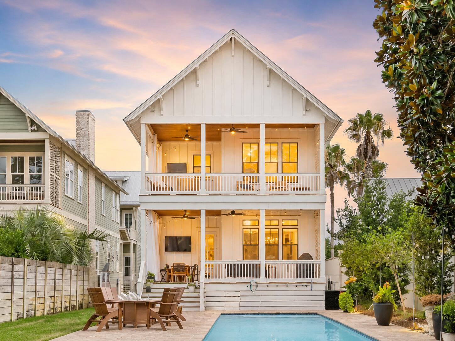 There are few places along the Emerald Coast where life unfolds with the quiet beauty found on the shores of Lake Powell. One of the world's rare coastal dune lakes, its glass-like waters, untouched shoreline, and breathtaking sunsets create a setting that feels worlds away--yet only minutes from the celebrated beaches and charm of 30A. This extraordinary waterfront estate is more than a home; it is a private sanctuary designed for generations to gather, celebrate, and reconnect. Anchored by an exquisitely appointed four-bedroom main residence and complemented by a beautifully crafted guest carriage house, the property offers an unparalleled blend of timeless architecture, refined craftsmanship, and effortless coastal elegance. From the moment you arrive, every detail invites you to slow down. Sunlight dances across the saltwater pool as the lake stretches endlessly beyond. A private dock becomes your gateway to unforgettable days on the water--morning paddleboard excursions through peaceful coves, leisurely cruises across Lake Powell, afternoons spent fishing with family, and evenings watching the sky ignite in spectacular shades of gold and crimson. Included with an acceptable offer, the Hurricane deck boat ensures your waterfront lifestyle begins the day you receive the keys. Inside, every space has been thoughtfully curated to complement the beauty just beyond the windows. The chef's kitchen serves as the heart of the home, anchored by a striking marble waterfall island, professional-grade appliances, and designer finishes that inspire everything from intimate dinners to unforgettable celebrations. Expansive gathering spaces flow effortlessly outdoors, while the tranquil primary suite offers a spa-inspired retreat where every morning begins with peaceful water views. Perhaps the home's greatest luxury is its remarkable balance of seclusion and convenience. Tucked away in one of Inlet Beach's most peaceful waterfront settings, you'll feel completely removed from the pace of everyday life, yet the sugar-white beaches of the Gulf, the architectural beauty of Alys Beach, the vibrant energy of Rosemary Beach, and the timeless charm of Seacrest are all just moments away. World-class dining, boutique shopping, scenic bike rides, and unforgettable beach days are always within easy reach, while the airport is only twenty minutes away. Whether envisioned as a legacy family retreat, an exceptional full-time residence, or a premier investment property, this is a once-in-a-generation opportunity to own one of the most coveted waterfront estates on Lake Powell. Here, luxury isn't measured by square footage or finishes alone--it's measured by sunrise reflections on the water, barefoot evenings on the dock, and the rare privilege of calling one of Florida's most extraordinary coastal landscapes home.