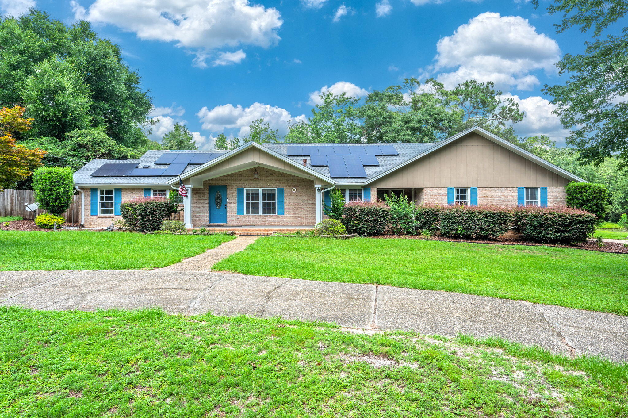The Farmhouse Estate Lifestyle provides a wonderfully unique and coveted warm family environment where you find yourself falling in love with your home over and over again. This 2025 partial remodel added bells and whistles. The Gathering Kitchen is a highlight whether having lunch with the family or the gathering spot for the entire extended family and friends during those special times and holidays when everyone is cooking or wants to be in the kitchen. Summers are special, and these 2.5 acres truly make this a home. You have a lofted 16x32' and powered shed. When you are home from RVing, park the RV on the 30 amp RV parking pad. The family will enjoy the uniqueness of fishing in the private pond fully stocked with (I seem to have misplaced what the pond is stocked with) and turtles. Those hot summer days will disappear with a cool drink and a dip in the 27 ft pool. This home is a wonderful lifestyle. Welcome Home! With acceptable offer, the seller will pay off the solar panels. If the buyer elects to assume the solar panel loan, the seller will reduce the purchase price by amount owed on solar panels.