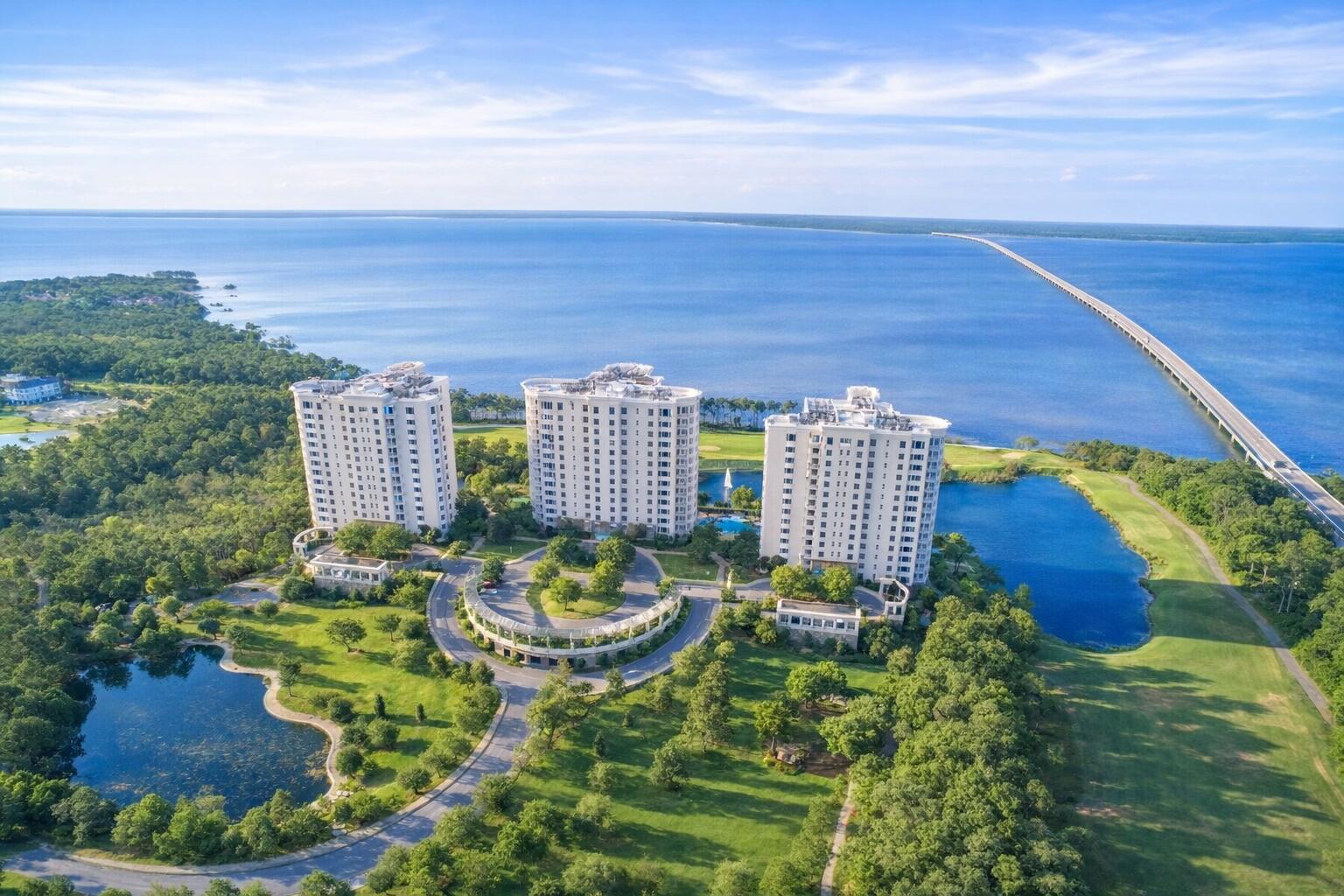 Positioned within Building 3, the westernmost tower of One Water Place, Residence 410 offers refined luxury condominium living within the gated community of Kelly Plantation. Don't miss this exceptional opportunity to own in one of the Emerald Coast's premier luxury condominium communities.
This fourth-floor Barclay floor plan spans over 2,600 square feet and features 3 bedrooms and 2.5 baths. The elevation offers the ideal balance -- high enough for beautiful bay views, yet perfectly positioned for convenient access and ease of day-to-day living. Inside, the open-concept floor plan captures water views from the main living area and primary bedroom, creating a stunning natural backdrop.
The primary suite is privately situated apart from the guest wing and offers balcony access. Two additional bedrooms are accessed through a private hallway from the foyer, creating a distinct guest retreat. The thoughtfully designed shared bath functions both as a powder room near the entry and as a full bath for the adjoining bedroom.
Additional conveniences include a spacious laundry room with ample storage, a conditioned storage unit located just outside the residence, and two assigned parking spaces in the secured garage.
Residents of One Water Place enjoy an exceptional amenity-rich lifestyle, including resort-style pools and hot tubs, a state-of-the-art fitness center, sports lounge, putting green and indoor golf simulator, dog park, garden, movie theater area, art room, walking paths, gated entry----plus much more! 
Beyond the One Water Place towers, Kelly Plantation offers a premier master-planned setting featuring a Fred Couples Signature golf course, clubhouse and dining, lighted tennis and pickleball courts, community pool and fitness facilities, scenic walking and biking trails, playground, and 24-hour guarded entrances -- all ideally located near Destin's beaches, shopping, dining, and the Mid-Bay Bridge for convenient travel.
Residence 410 presents a rare opportunity to secure spacious, sophisticated coastal living in one of Destin's most established luxury communities.