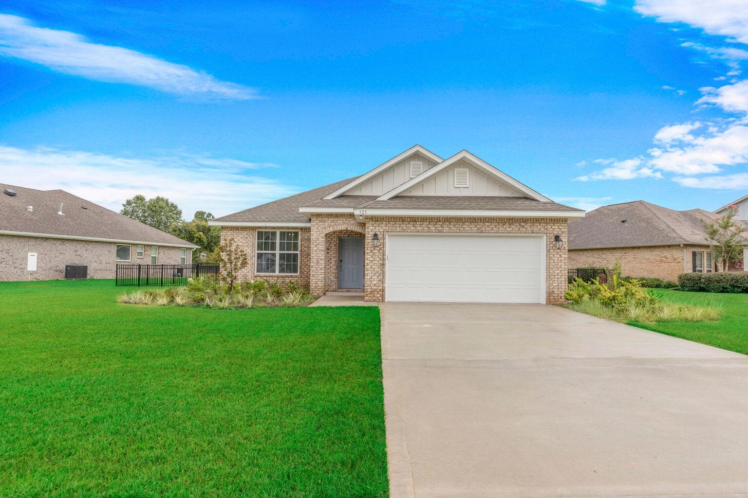 Better than new, built in 2021, welcome to this spacious and upgraded 3 bed 2 bath home with designated office! This home has all of the upgrades you would expect in Hammock Bay including stainless steel appliances, quartz countertops, engineered vinyl plank flooring throughout to include bedrooms, 42'' cabinets. Custom closets in all 3 bedrooms, custom built pantry, and 13' of built in cabinets/workspace the full length of the wall in office! Owners will enjoy the upgraded lighting in kitchen and fans in all bedrooms and living room.  The 4 foot garage extension allows for plenty of additional storage room. Enjoy the completely fenced in large back yard from under the covered porch that overlooks the pond.