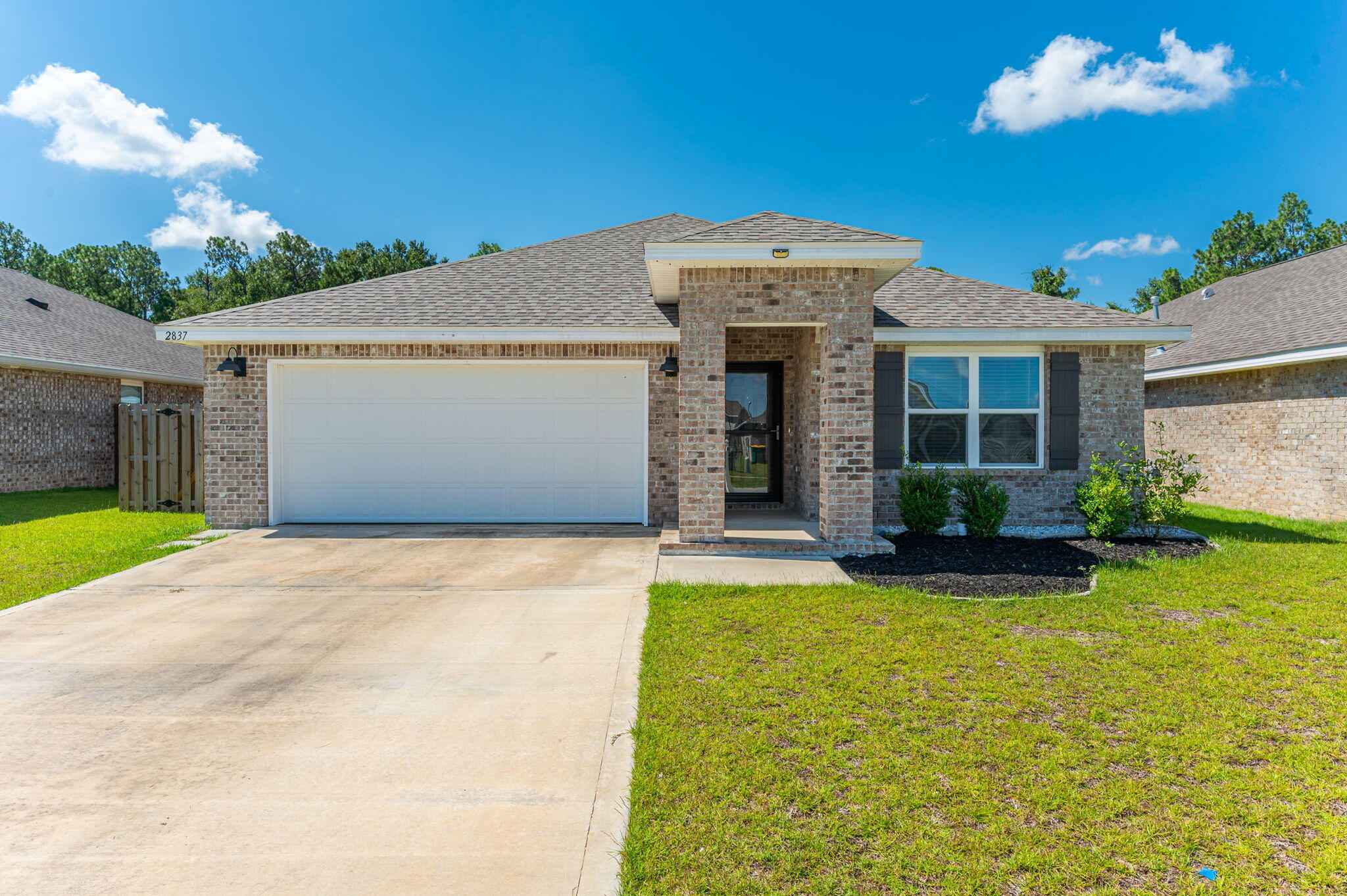 Modern 4-Bedroom All-Brick Home in Crestview with Spacious Yard, Upgrades and Community Pool
Marketing DescriptionThis beautifully maintained, single-story all-brick home in Crestview offers the perfect blend of modern design and everyday functionality. With 4 bedrooms and 2 bathrooms, this home features a split floor plan ideal for both privacy and convenience.

Step inside to discover luxury vinyl plank flooring throughout the main living areas, paired with a bright, open-concept kitchen, dining, and living space. The kitchen is designed for style and function with stainless steel appliances, a gas range, tile backsplash, pantry, large kitchen island, and modern finishes.

All bedrooms feature plush carpet and ceiling fans, and the private primary suite includes a spacious glass-enclosed walk-in shower, dual vanities, water closet, and walk-in closet. The guest bath offers a convenient shower/tub combo.

Out back, enjoy a covered patio that leads to a large, fully usable yard complete with a storage shed and additional side storage space.

Property Highlights:
• 4 Bedrooms | 2 Bathrooms
• All-brick, single-story construction
• Luxury vinyl plank flooring & plush carpet in bedrooms
• Open kitchen-living-dining area with modern finishes
• Stainless steel appliances & gas range
• Split bedroom layout
• Large primary suite with dual sinks and walk-in shower
• Covered back patio
• Spacious yard with shed and additional side storage


Conveniently located near Crestview amenities schools, and commuting routes--this home offers comfort, space, and style. Pet considered with application. Contact us today for a showing!