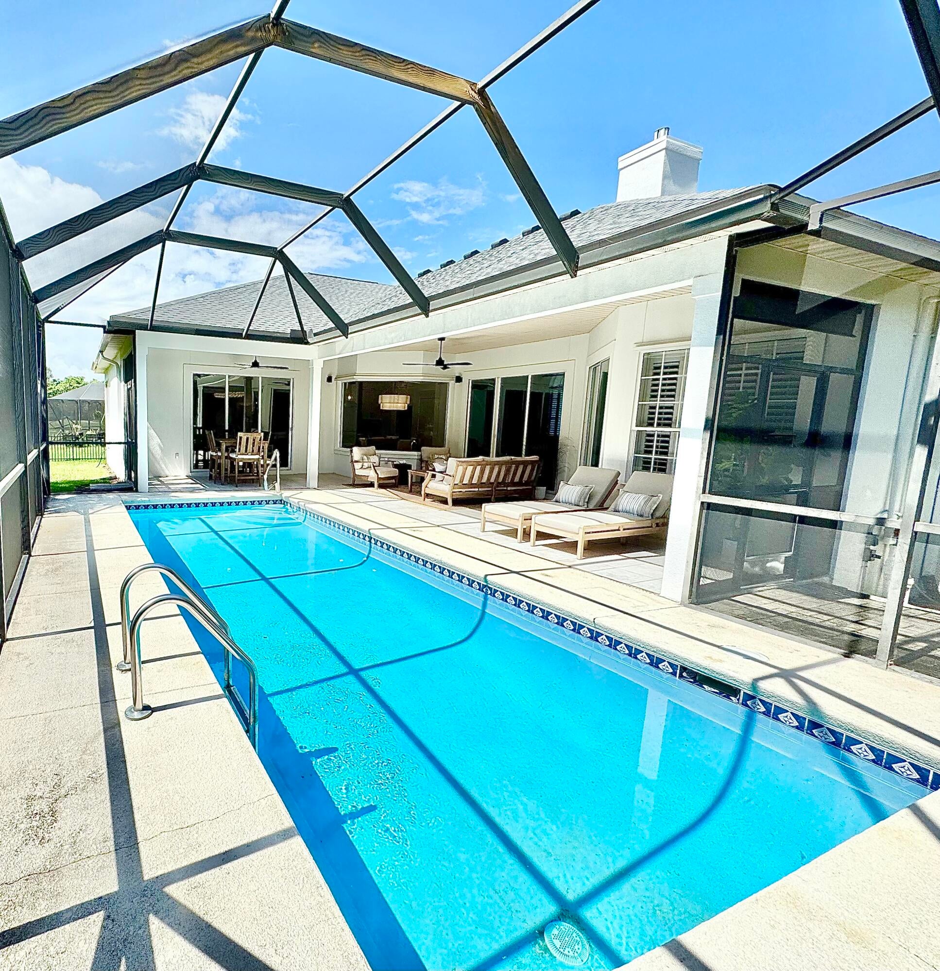 LOCATION, DESIGN, AND LIFESTYLE. 212 Wekiva Cove is a truly turnkey residence in the amenity-rich gated community of Emerald Lakes, ideally positioned between Destin and Miramar Beach. Direct access to highway 98 with a signaled light for easy access. Just approximately one mile from the beautiful white-sand beaches of the Emerald Coast, this exceptional home places you minutes from premier dining, shopping, golf, healthcare, Whole Foods, Destin Commons, and the Silver Sands Premium Outlets. From the moment you enter, the home's impressive scale and attention to detail are immediately evident. The grand entry features soaring 14-foot ceilings, an expanded driveway, and an abundance of glass windows overlooking the private oversized pool and tranquil lake. The home has been thoughtfully upgraded throughout with newly painted interiors, elegant crown molding, high-end trim details, recessed lighting, and beautiful high-oak-toned flooring that creates a sophisticated yet inviting coastal atmosphere. The open-concept floor plan has 10 foot ceilings throughout, and has been redesigned to maximize everyday functionality and  entertainment, with nearly every room offering direct access to the screened-in pool and expansive outdoor living area. The seamless indoor-outdoor layout allows natural light to flow throughout the home. At the heart of the home, the custom kitchen features top-to-bottom cabinetry, an expansive center island, stainless steel appliances, updated hardware, and ample room. The formal dining area features custom shiplap accents, while carefully selected architectural details throughout the residence elevate the overall design and provide a refined coastal feel.

The spacious primary suite is designed as a private retreat, featuring a beautifully appointed ensuite bathroom with glass shower/tub combo and his-and-hers closets with built-in shelving. Every aspect of the home has been thoughtfully considered for comfortable full-time living while offering the flexibility and appeal of an exceptional second home or coastal retreat.

Outside, the private oversized pool, new pool equipment, screened enclosure, lake views, and generous outdoor living space create a true resort-style atmosphere in the comfort of your own home. Whether you're hosting family and friends, enjoying a quiet evening by the pool, or simply taking advantage of the Emerald Coast lifestyle, 212 Wekiva Cove delivers an exceptional combination of luxury, privacy, and convenience.
Emerald Lakes offers an impressive collection of amenities, including a community pool, tennis courts, pickleball courts, basketball court, and playground--all included with an exceptionally low HOA of just $118 per month. Please inquire to see which furnishings will convey with the home.