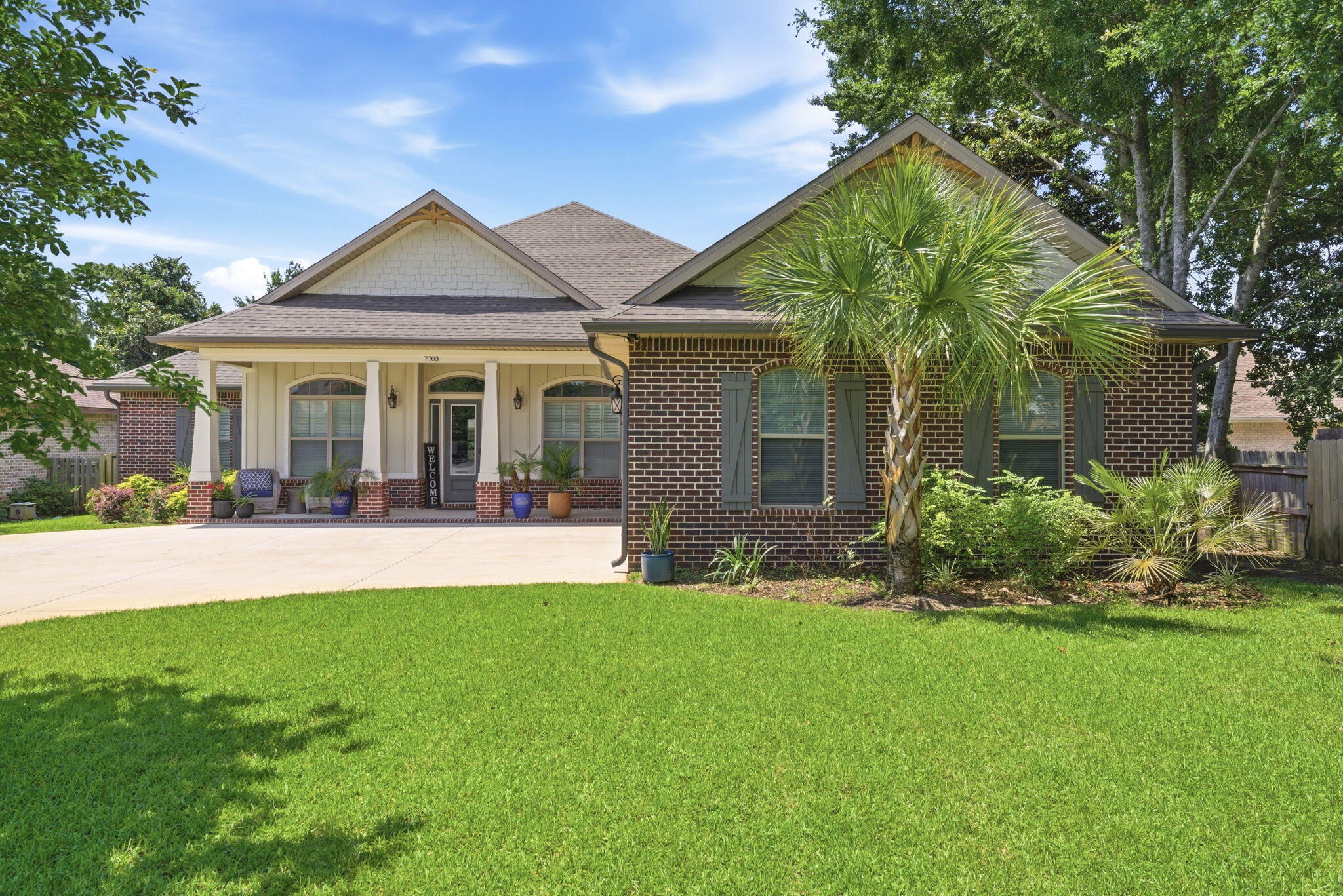 Welcome to this stunning custom-built home located in the gated waterfront community of Camellias in Navarre. Situated on a spacious cul-de-sac lot, this 4-bedroom, 3-bathroom home with a dedicated office offers nearly 3,000 square feet of thoughtfully designed living space and access to the Santa Rosa Sound through the community dock and deeded waterfront amenities.

Step inside to discover an open-concept floor plan featuring elegant finishes, tray ceilings, recessed lighting, and abundant natural light. The chef's kitchen is the heart of the home, boasting a large center island, granite countertops, soft-close cabinetry, stainless steel appliances, natural gas cooktop, and a generous pantry--perfect for entertaining and everyday living.

The spacious primary suite is a true retreat, featuring two walk-in closets, a luxurious ensuite bath with double vanities, a garden tub, and an oversized walk-in shower with direct access to the laundry room for added convenience. A split-bedroom design provides privacy for family and guests, while the dedicated office offers the perfect space to work from home.

Outside, enjoy a large covered patio overlooking the fenced backyard, ideal for outdoor dining, relaxing, and entertaining. Additional features include hurricane shutters, sprinkler system, lawn pump, two-car garage with 5 panel garage door for oversized SUV's and Trucks, and energy-efficient construction. Located just minutes from Navarre Beach, shopping, dining, and top-rated schools, this exceptional property combines modern luxury with the laid-back coastal lifestyle that makes Navarre one of Florida's most desirable communities.

Schedule your private showing today!