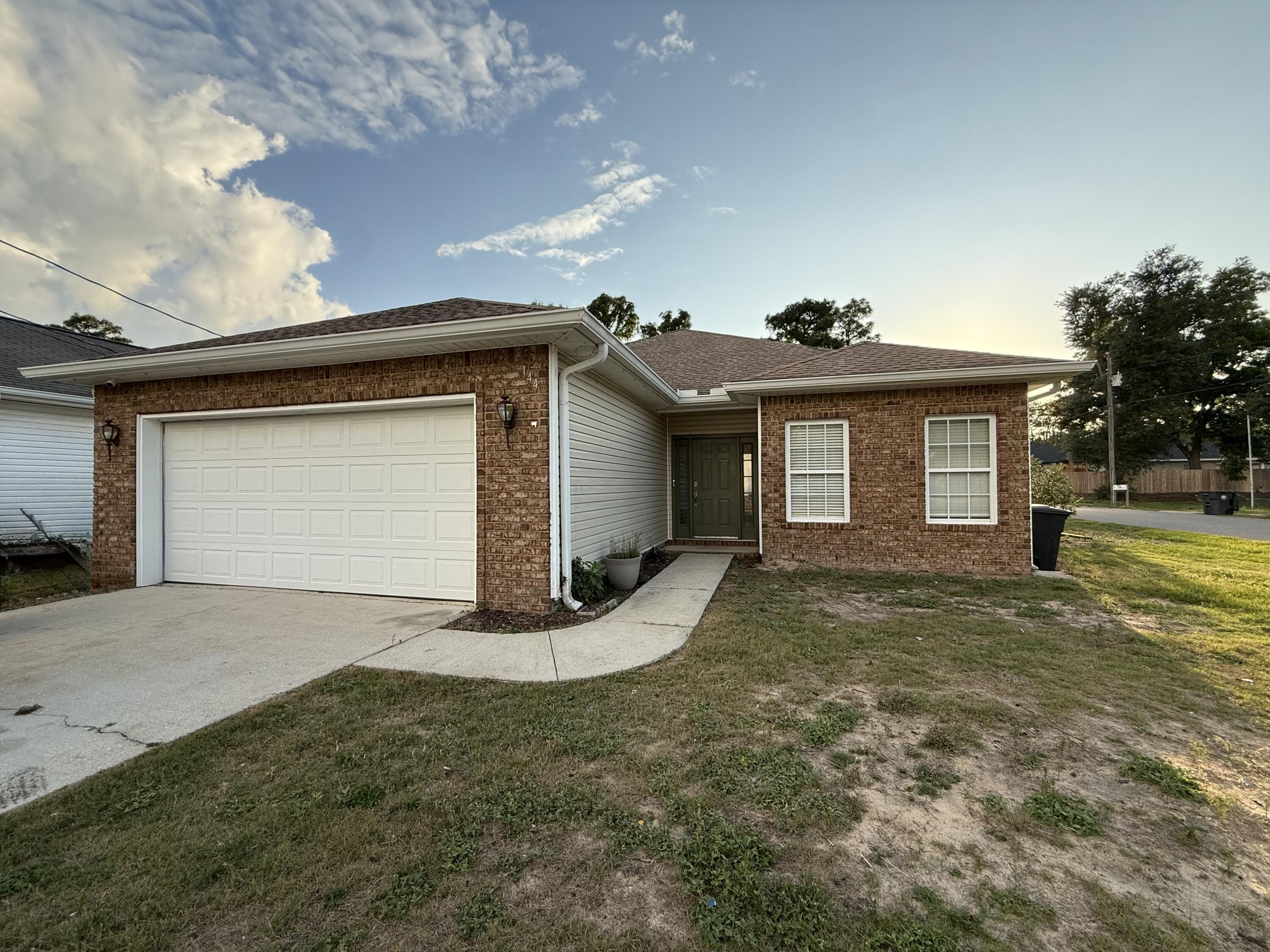 NEW ROOF and repairs are complete; appraisal for previous buyer complete! Home fell through on closing day at no fault of seller! 

Seller offering carpet credit!

Located on an oversized corner lot, this inviting 3-bedroom, 2-bath home features a spacious layout and a beautifully private backyard complete with a covered lanai and screened patio (SCREEN REPLACEMENT OFFERED)-- ideal for outdoor gatherings or quiet evenings at home.

Step inside to discover an airy open floor plan highlighted by 9-foot ceilings, elegant oversized baseboards, and a cozy wood-burning fireplace that serves as the focal point of the living area. The kitchen offers a convenient breakfast bar along with a dedicated dining space for everyday meals or entertaining guests.

Just off the kitchen, you'll find a versatile bonus area that can easily function as a home office with views into the living room or provide additional storage space to fit your needs.