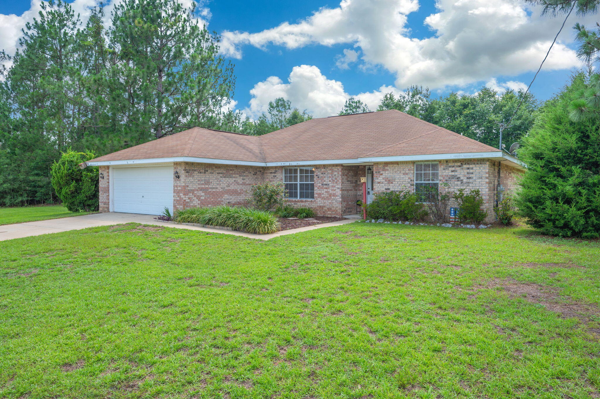 ***Charming All-Brick 4-Bedroom, 2-Bath Home on a Large Level Lot*** BRAND NEW HVAC*** Welcome home to this beautiful all-brick 4-bedroom, 2-bath residence in Laurel Hill. Offering a spacious and functional layout, this home features an oversized living room with plenty of space for large furniture and comfortable entertaining. The galley-style kitchen adjoins the dining area and comes complete with all appliances, including the refrigerator, making your move-in process even easier. The generously sized primary suite is a relaxing retreat, highlighted by an elegant tray ceiling. The en-suite bathroom features dual vanities and a large walk-in closet, providing both comfort and convenience. Three additional bedrooms offer ample space for family, guests, or a home office. Outside, you'll find a large, level lot with plenty of room for outdoor activities, gardening, or future enhancements. Don't miss this opportunity to own a well-maintained home with space, comfort, and versatility both inside and out.