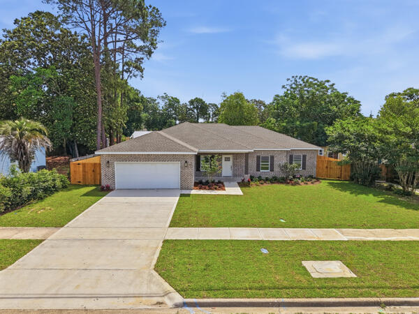 Step outside to a beautifully landscaped yard designed for both curb appeal and convenience, complete with a well pump, irrigation system, and a 6 foot privacy fence for added comfort and ease of maintenance.

Enjoy ample storage with a two car garage and an oversized pantry. Schedule your showing today!