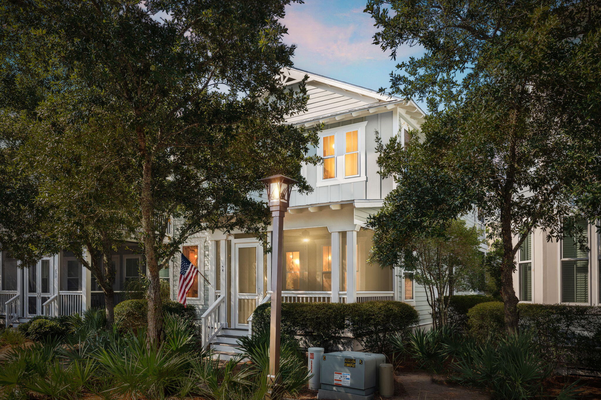 Introducing 844 Sandgrass Boulevard in NatureWalk at Seagrove - a truly rare opportunity! Homes in this prime location don't come available often, and this one is situated directly across from the community pool, playground, Lily Lane beach shortcut, and preserve boardwalk trails. Best location in the neighborhood for an investment/rental! Offering the ideal blend of convenience, charm, and tranquility, this home is an absolute must-see.

Step inside and experience a well-maintained, never-rented property showcasing solid pine floors and high-end furnishings. The layout is both functional and stylish, with a first-floor primary suite and two additional en suite bedrooms upstairs. A loft, a bunk room, and a unique 4.5 bath configuration provide ample space for family and guests.