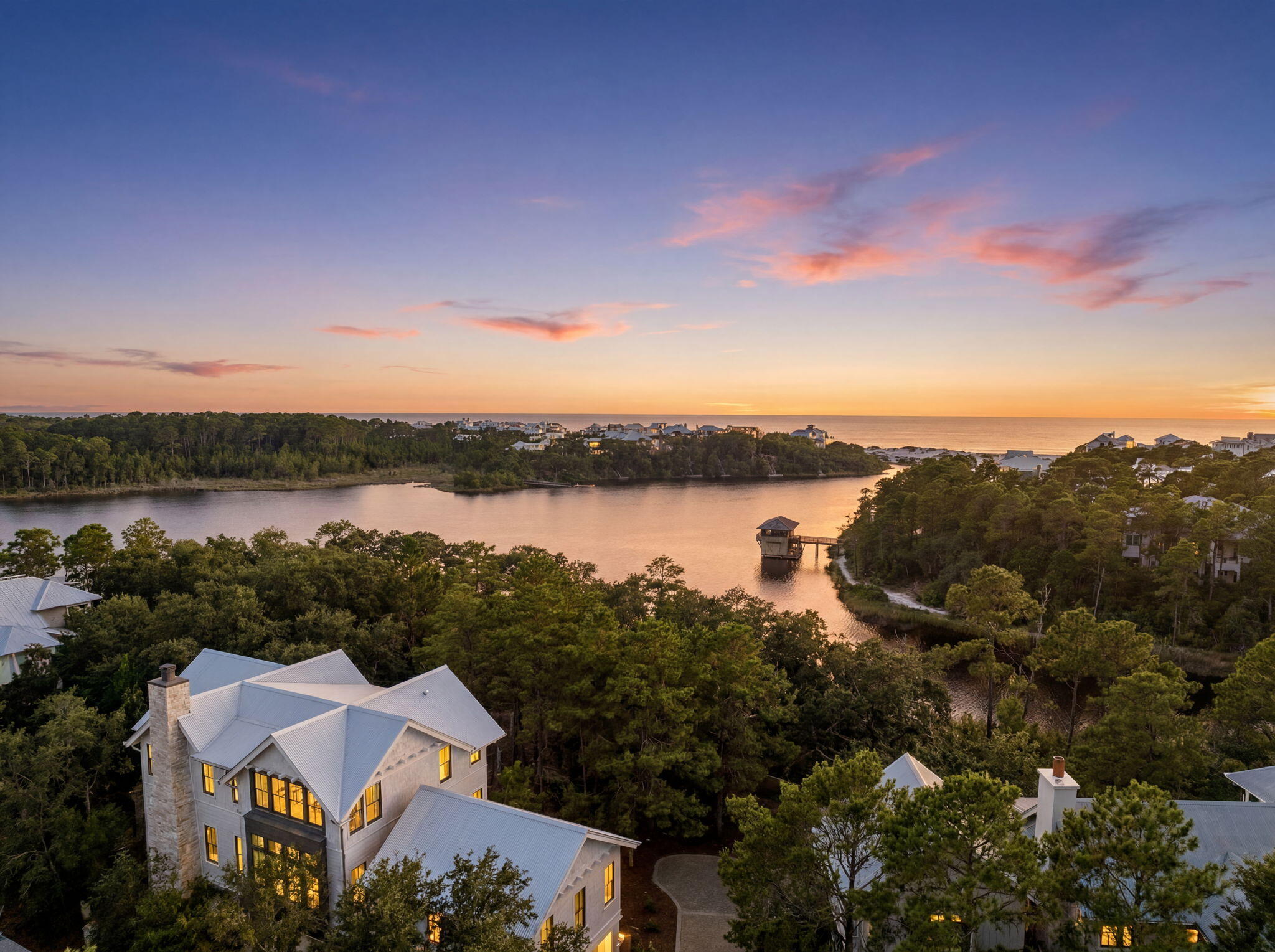 Imagine pulling into your own private drive at the end of the day, the sound of water instead of traffic, a view of the Gulf and Draper Lake stretching out where your future home will stand. This is a rare lakeside offering, backing directly to the community's butterfly garden with no neighbor on that side, a kind of privacy that's nearly impossible to find left on 30A.
Draper Lake is an exclusive, gated community that celebrates the natural beauty of its surroundings, planned by Duany Plater-Zyberk & Company, the same visionary firm behind Seaside, Rosemary Beach, and Alys Beach. Outdoor enthusiasts will love the abundant opportunities for fishing, hiking, kayaking, and paddleboarding, all just steps from your future doorstep. Enjoy easy access to pristine beaches and the serene waters of Draper Lake, along with two boathouses, a lookout tower, resort style pools, and winding walking trails through the natural landscape.
Preliminary plans by acclaimed architect Geoff Chick offer a vision for what could rise here, a home designed to capture the lot's views and the rhythm of coastal living. This is more than a lot. It's the beginning of a life lived slower, closer to water, minutes from 30A's dining, shopping, and bike path, yet worlds away from the everyday.