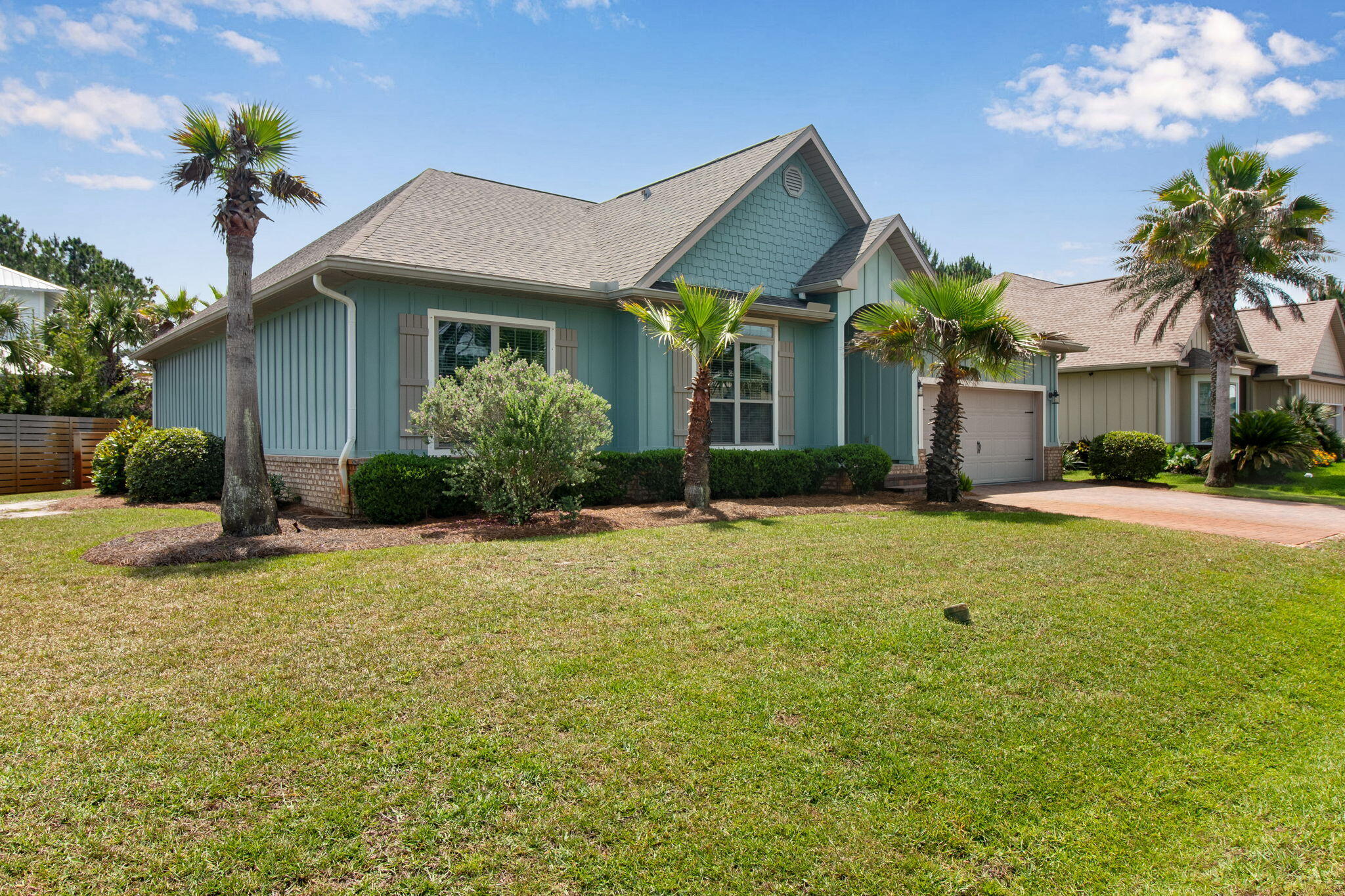 Welcome to coastal living along the 30A corridor. This beautifully maintained residence offers the perfect blend of comfort, style, and low-maintenance living just minutes from the sugar-white beaches and emerald waters of the Gulf Coast.
From the moment you arrive, you'll appreciate the home's charming coastal architecture, paver driveway, manicured landscaping, and welcoming front entry. Inside, soaring tray ceilings, crown molding, plantation shutters, and luxury flooring create a bright and inviting atmosphere throughout.
The open-concept floor plan is ideal for both everyday living and entertaining, featuring a spacious great room that flows seamlessly into the dining area and kitchen. The kitchen offers stainless steel appliances, abundant cabinetry, a large center island, generous counter space, and a functional layout designed for gathering with family and friends.
The spacious primary suite serves as a private retreat with a tray ceiling, spa-like ensuite bath featuring dual vanities, an oversized walk-in shower, and ample storage. Additional guest bedrooms and baths are thoughtfully designed to provide comfort and privacy for family and visitors alike. Outside, a vine-covered pergola creates an inviting outdoor living space perfect for al fresco dining and entertaining. Residents also enjoy access to a beautiful resort-style community pool, offering the perfect place to cool off after a day on the Emerald Coast or spend leisurely afternoons enjoying the Florida 
lifestyle.
Conveniently located near 30A, Grand Boulevard, Sacred Heart Hospital, championship golf courses, shopping, dining, and world-famous beaches, this exceptional home delivers the relaxed coastal lifestyle that makes Santa Rosa Beach one of Northwest Florida's most sought-after destinations.