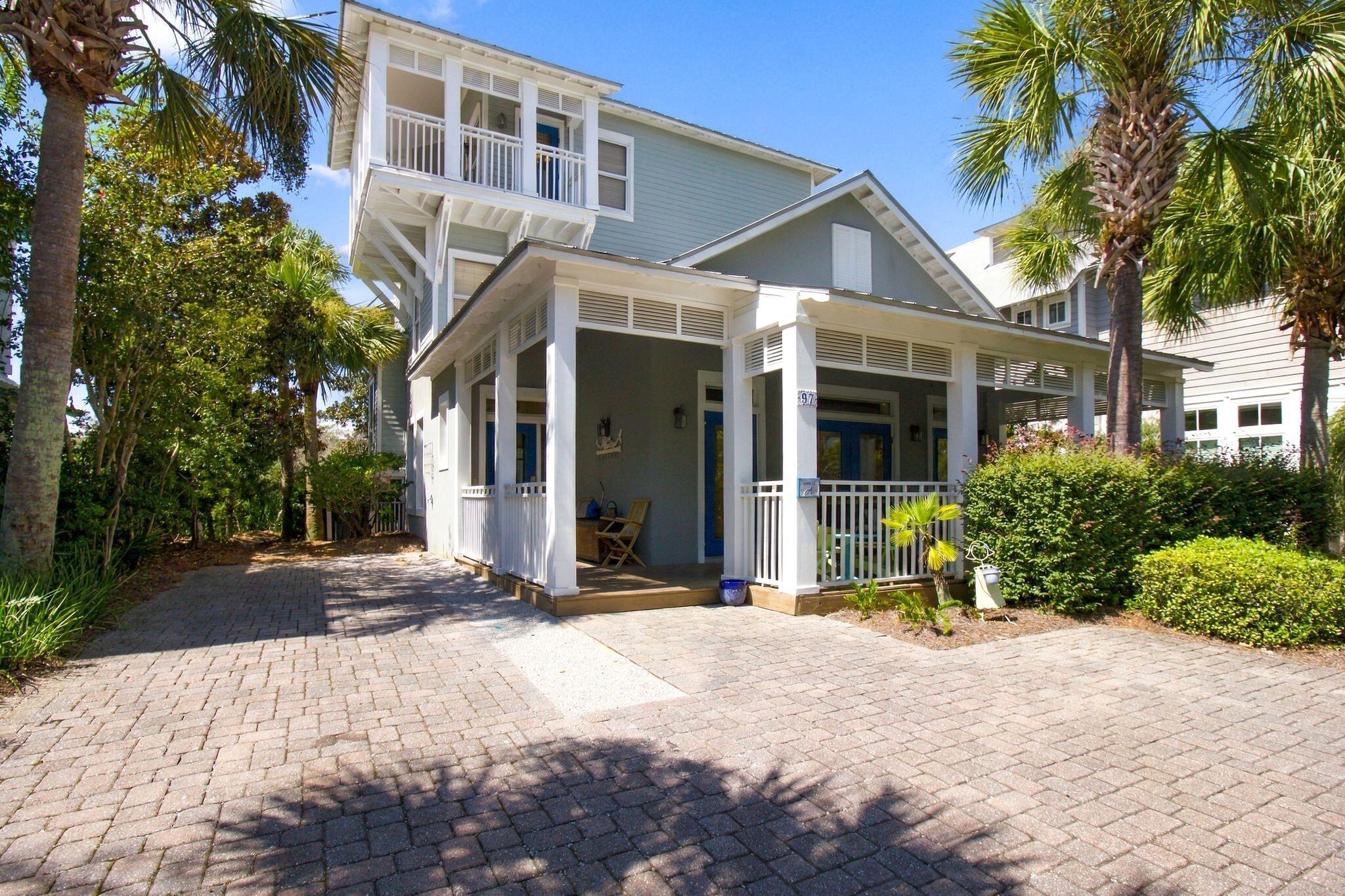 Welcome to your ideal Seacrest Beach getaway! Nestled between Rosemary Beach and Alys Beach, Seacrest offers easy access to an incredible selection of shops, restaurants, and coastal attractions.

Set on an exceptionally large, private lot with no home directly behind you, this 5-bedroom, 4.5-bath home provides plenty of space and privacy. The home features two full-size primary suites, including one conveniently located on the first floor, making it comfortable and accessible for guests of all ages. Wrap-around porches span all three levels, offering abundant outdoor living space.

The top floor features  a spacious den adjacent to the fifth bedroom,  convenient wet bar and large wrap around balcony  This flexible space is ideal for kids, extended family, or a second gathering area, making the home especially well-suited for multiple families vacationing together.

With its unbeatable location, oversized private lot, generous living spaces, multiple primary suites, and three levels of wrap-around porches, this Seacrest Beach home offers an exceptional combination of privacy, comfort, and convenience. Guests enjoy access to the community's extensive 12,000-square-foot pool, scenic walking trails, and lush green spaces, along with deeded beach access and convenient tram service to the beach.