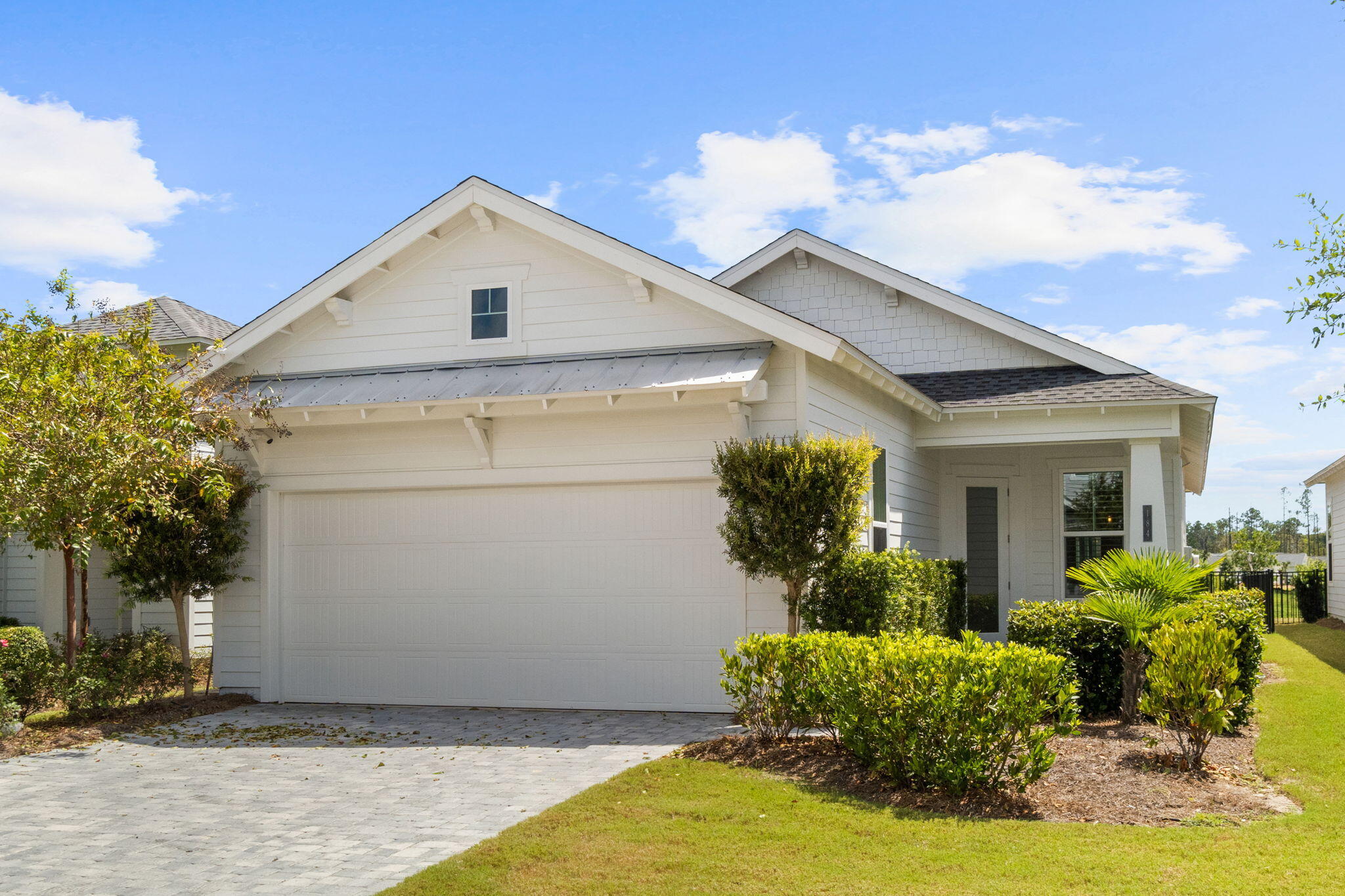 Like-new 3-bed, 2-bath home in gated NatureWalk at WaterSound Origins -- just steps from the neighborhood amenity center with pickleball and tennis courts, community pool, modern fitness center, and social gathering space. No expense was spared on this Bonita floorplan: plantation shutters throughout, upgraded quartz counters, premium tile, and LVP flooring flow across the open living spaces. The living room is accented with wood ceiling beams and opens to a screened back porch overlooking a fenced backyard and peaceful pond. Conveniently located by the neighborhood's new back entrance for easy access to Publix, medical services, restaurants, and shopping, plus community perks like the Lake Powell dock, additional courts, and unlimited play on a nationally recognized par-3 golf course. A short drive to Inlet Beach and scenic 30A -- a turnkey, low-maintenance beach-area retreat with resort-style amenities and neighborhood privacy.