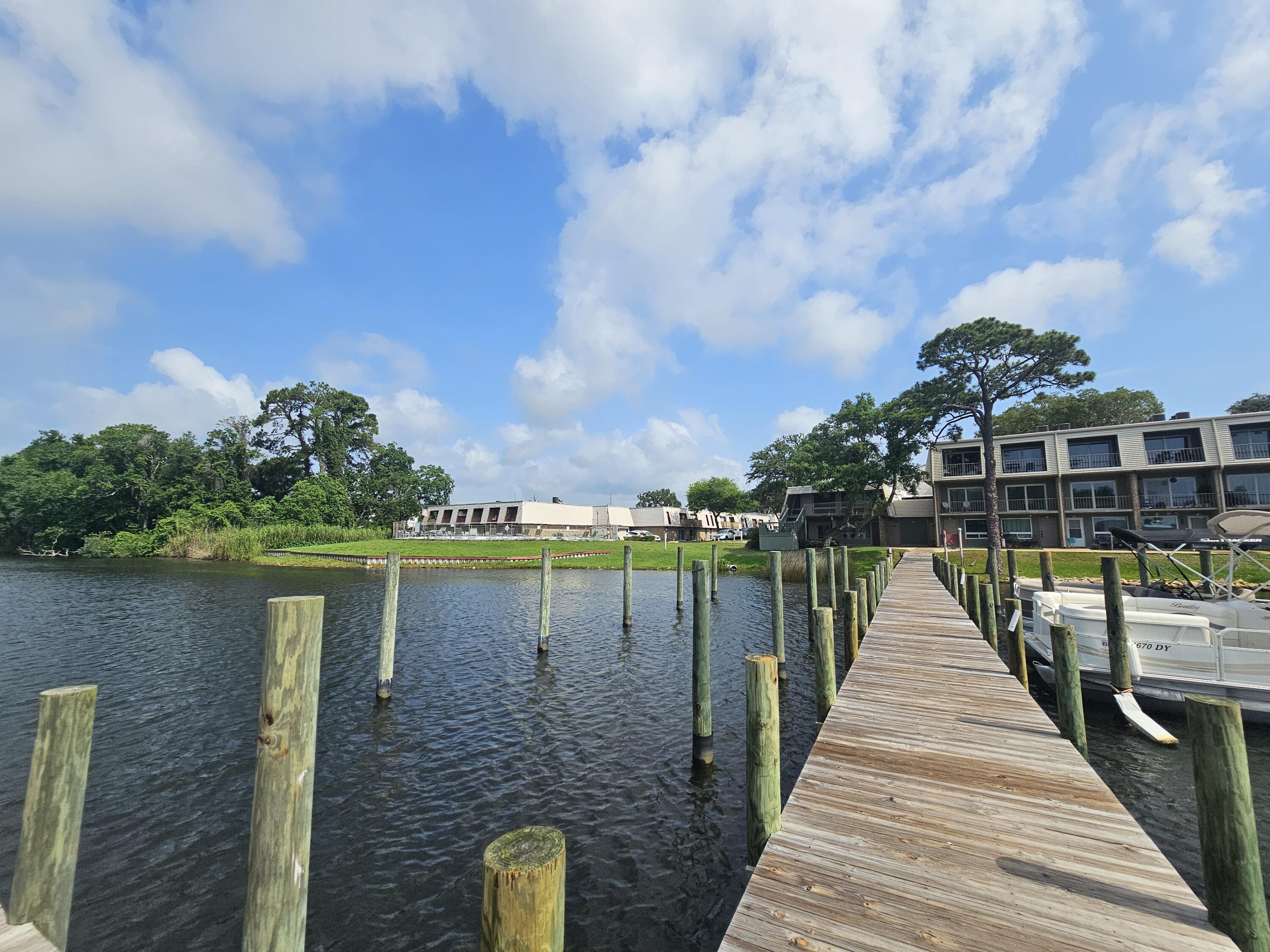 WATERFRONT COMMUNITY! Enjoy affordable waterfront living in the heart of Fort Walton Beach! This updated 2-bedroom, 1-bath condo is located in Pier One Condominiums, a waterfront community situated on beautiful Cinco Bayou.

Inside, you'll find updated laminate flooring, refreshed kitchen cabinetry and countertops, newer appliances, and a nicely updated bathroom, creating a move-in-ready space that's comfortable and inviting. A private balcony provides the perfect spot to enjoy your morning coffee or unwind after a day on the water.

Residents enjoy access to approximately 415 feet of waterfront on Cinco Bayou, a waterfront swimming pool, fishing dock, and boat slips (subject to HOA availability and approval). The unit previously featured an in-unit laundry area, the plumbing connections may still be available behind the wall, offering potential future convenience.

Conveniently located near shopping, dining, beaches, and military bases, this condo offers an excellent opportunity for a primary residence, second home, or investment property. Experience the benefits of waterfront community living at an affordable price.

Enjoy the waterfront lifestyle without the waterfront price tag!
All information is deemed to be accurate, buyers should verify any information important to them.