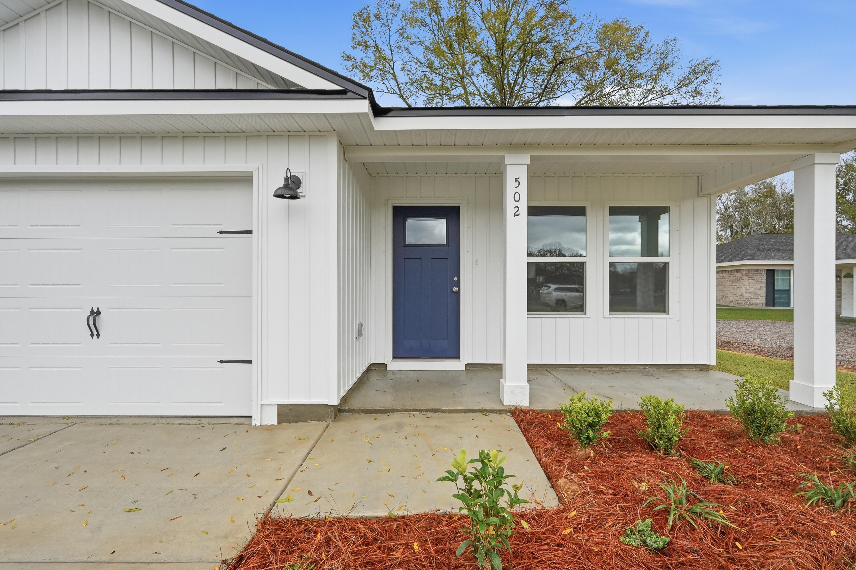 MID TOWN LOCATION AND READY IN LATE JUNE - $12,000 towards buyers closing costs (call for details).  ''Scarlet'' floor plan fits the budget, not too big and not too small.  Quartz work island w/bar seating in kitchen, large walk-in pantry, open family gathering space, owner's bath has walk-in closet, double vanities, shower only + linen storage.  Raised ceilings, vinyl plank flooring throughout, recessed lighting, ceiling fans in all bedrooms + family room.
Fully landscaped yard, front & rear porches for relaxing, finished 1-car-garage.  Photos of similar sold home, elevation will vary, interior/exterior colors & finishes will vary.  Call for more details.
