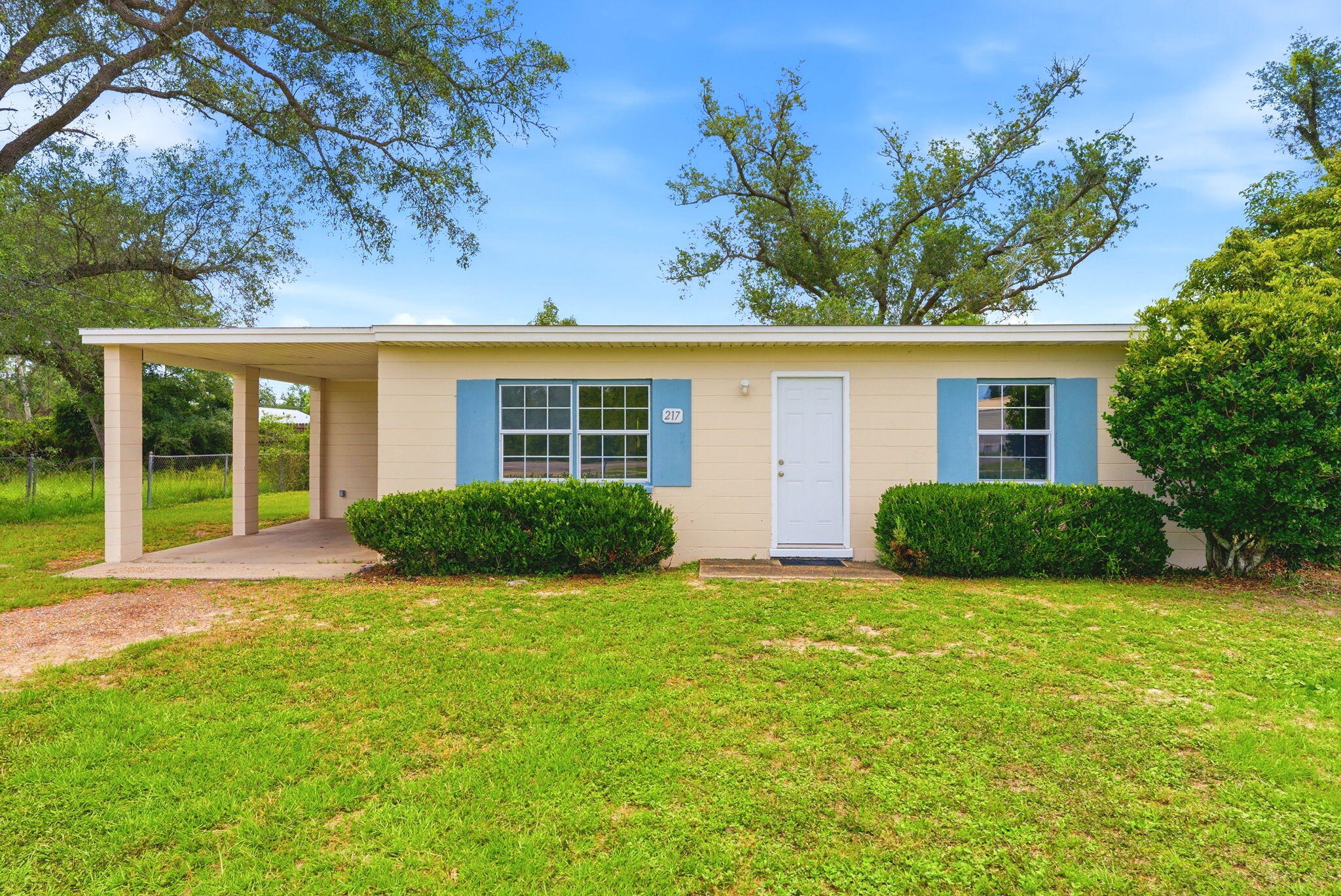HOME IS CURRENTLY UNDER CONTRACT WITH 72 HOUR KICK OUT CLAUSE** 
Welcome to 217 S Berthe Avenue, a beautifully remodeled and move-in-ready home offering the perfect blend of comfort, convenience, and low-maintenance living. Situated on a spacious .30-acre lot shaded by mature oak trees, this charming 2-bedroom, 1-bathroom block home is ideal for first-time homebuyers, downsizers, or savvy investors seeking a turnkey rental opportunity. Completely remodeled down to the studs in 2022, the home features luxury vinyl plank flooring throughout, an updated kitchen with white cabinetry, subway tile backsplash and newer appliances, along with a stylishly renovated bathroom showcasing designer tile and a tub/shower combo. Major system updates provide added peace of mind, including a new roof installed in April 2024 and a 2022 HVAC system with both interior and exterior units replaced. A new hot water heater was also installed in 2022. Step outside to enjoy the large backyard, offering plenty of room for pets, entertaining, gardening, or simply relaxing beneath the shade trees. Located in desirable Flood Zone X where flood insurance is typically not required, this property also offers the freedom of no HOA restrictions. Conveniently located just minutes from Walmart Supercenter, shopping, dining, and approximately 10 minutes from Tyndall Air Force Base, this home combines affordability, functionality, and location in one attractive package. Whether you're looking for your first home or a solid investment property with minimal upkeep, 217 S Berthe Avenue checks all the boxes. Schedule your private showing today!