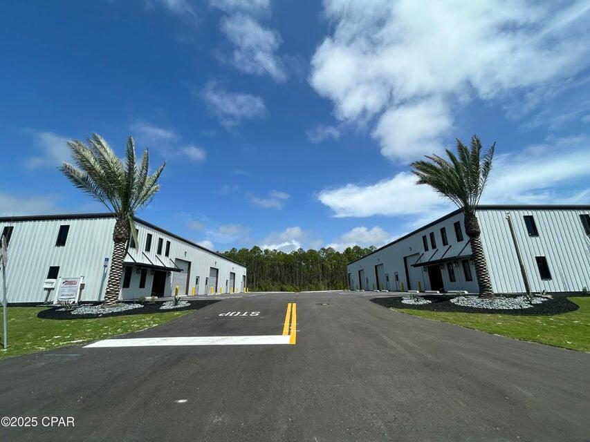 Brand-new warehouse and office space available on West end of Panama City Beach, located close to Hwy. 79, Airport, Pier Park and amongst a lot of other businesses in the commercial industrial park.  Warehouse height is 20' with 12' doors and floor space is 7,540 sq.ft. and office space is 3,120 sq.ft. with 8' ceilings, totaling 10,660 sq.ft.  Adjacent warehouse and office building is a replicate and available for lease as well, to total 21,320 sq.ft.  Monthly rent is $5,000/month for the 3,120 sq.ft. office space. Warehouse is available for rent.  Several options available please inquiry. Tenant responsible for utilities, maintenance and insurance