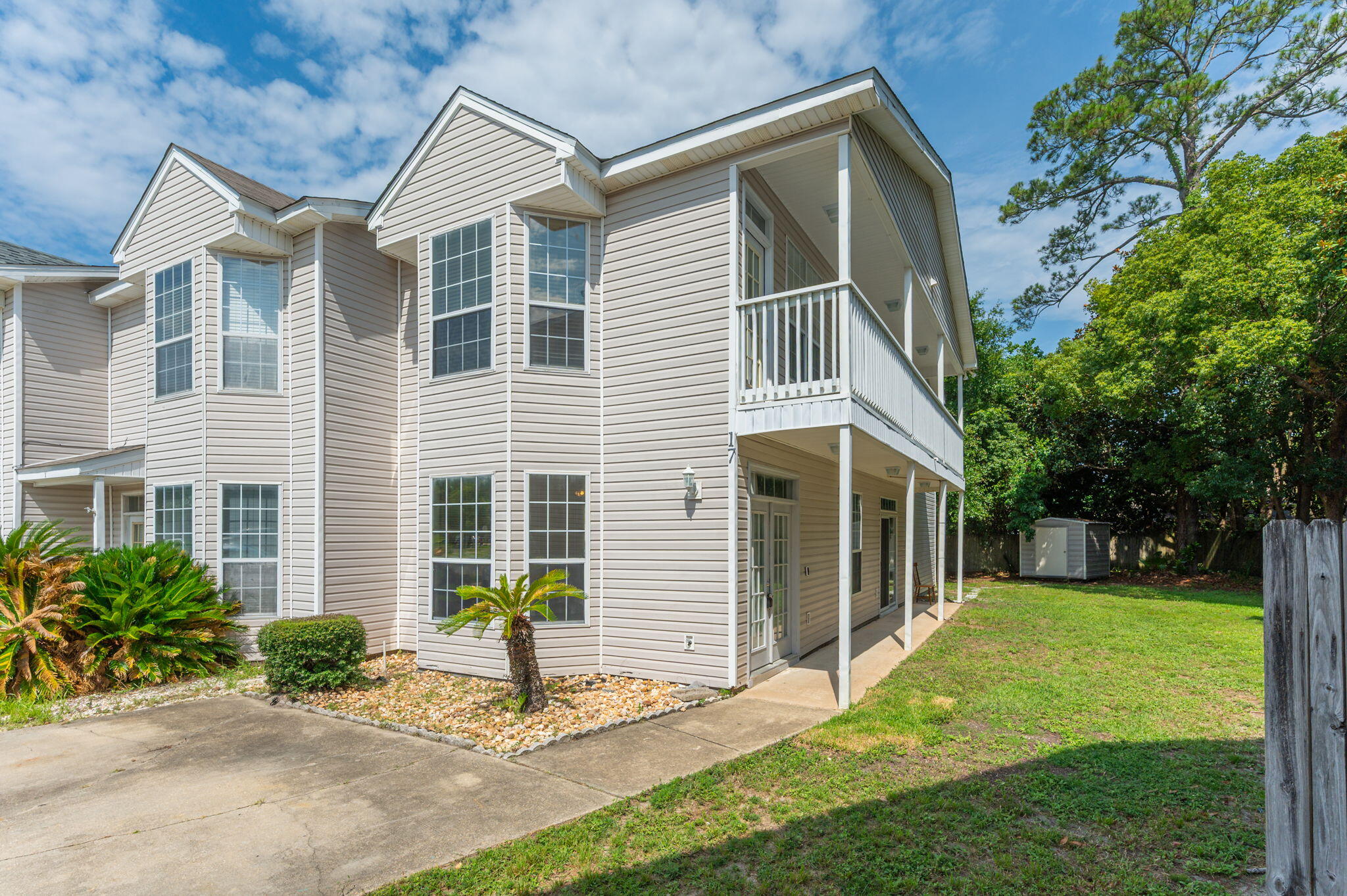 Welcome to this beautifully designed 3-bedroom, 3-bathroom townhome in the heart of Fort Walton Beach! Offering a thoughtful layout, modern finishes, and abundant natural light, this home provides comfortable living with plenty of space to spread out.

The main living area features luxury vinyl plank flooring and a bright bay window that fills the space with natural light. The well-appointed kitchen includes a center island, sleek black appliances, pantry, and a convenient pass-through opening to the dining area--creating an open feel and making entertaining a breeze.

A full guest suite is located on the first floor and features a painted accent wall, ceiling fan, and a spacious bathroom with a generously sized vanity. Upstairs, you'll find a second guest bedroom, full bathroom, and a spacious primary suite.

The primary suite offers a beautiful bay window with access to a private balcony, a dual vanity, and a walk-in closet complete with custom shelving for exceptional organization.

With its versatile floor plan, stylish finishes, private balcony, and desirable central location, this townhome offers the perfect blend of comfort, convenience, and functionality. Don't miss your opportunity to call this beautiful property home--schedule your showing today! Pets considered with application.