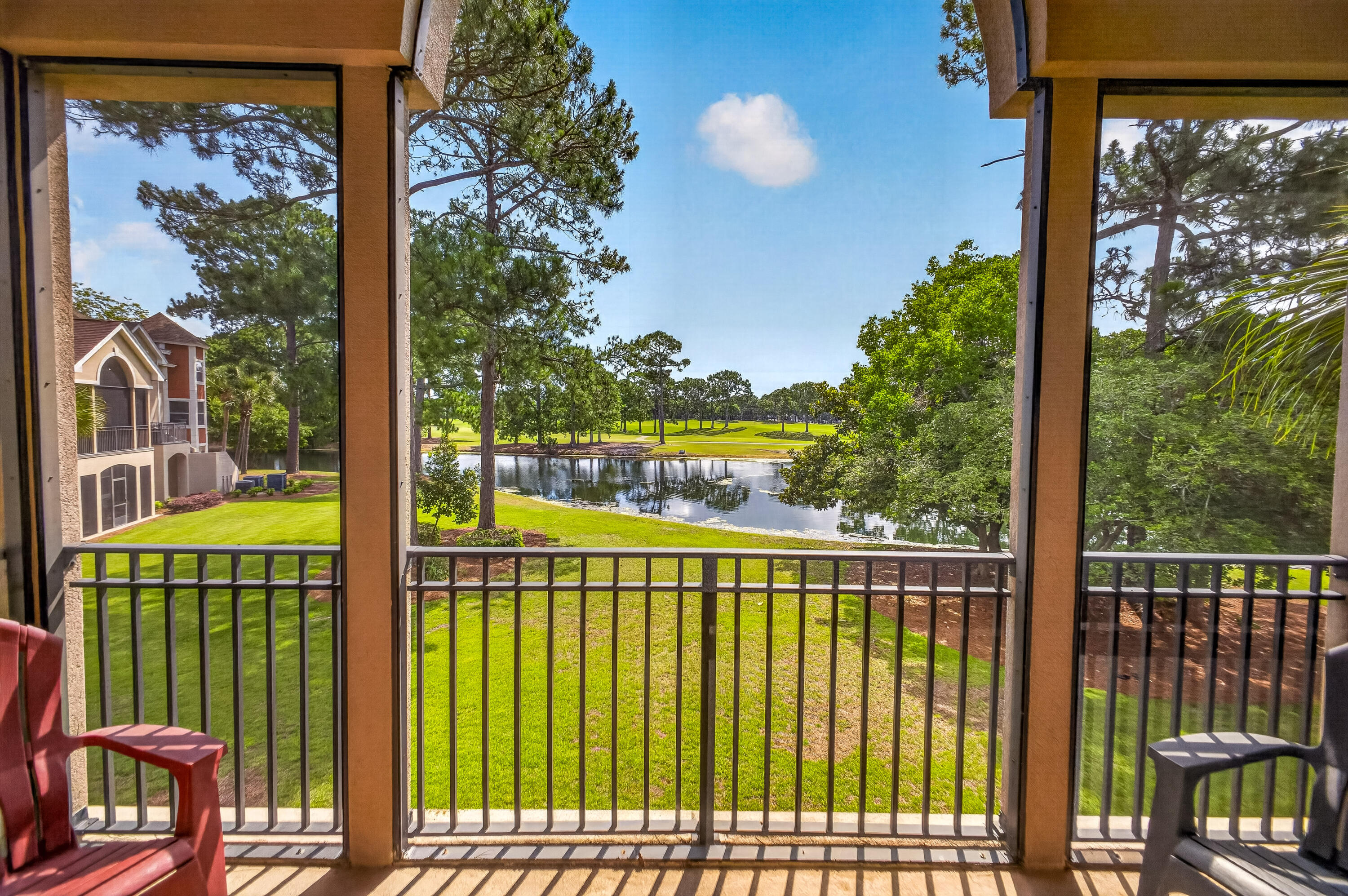 Immaculate and beautifully maintained, this fully furnished condo offers tranquil lake views from a private screened porch and enjoys a prime location near the Baytowne Marina, Sandestin Tennis Center, and The Village of Baytowne Wharf. The open-concept floor plan is ideal for both relaxing and entertaining, featuring a spacious kitchen with solid surface countertops, breakfast bar, ample cabinetry, and recent kitchen updates completed in 2020.

The primary suite includes a king-size bed and a spacious en suite bathroom with a soaking tub, walk-in shower, and double vanity. Two additional bedrooms, a full guest bathroom, and a large laundry room provide plenty of space for family and guests.

Recent improvements include kitchen updates (2020), hot water heater (2020), and HVAC system (2023), offering peace of mind and added value. This move-in-ready residence combines comfort, convenience, and an exceptional resort lifestyle. As an introduction to the Sandestin lifestyle, we invite our new owners to explore amenities that make Sandestin special. The listing brokerage and seller(s) are presenting the buyer(s) of this property with (2) 90-minute rounds of Tennis court time, a golf foursome at one of our three championship courses, and a round of golf for up to four (4) players at the unrivaled Burnt Pine Golf Club.