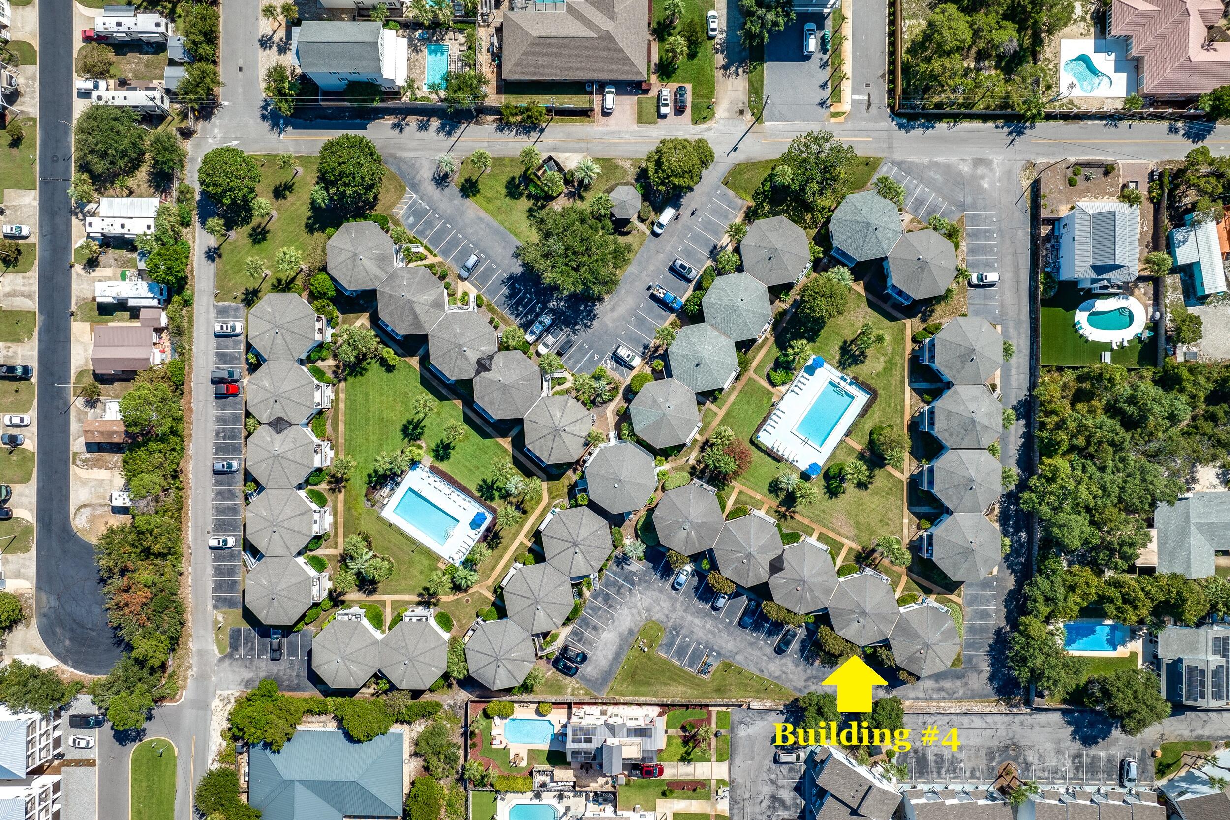 A MUST SEE ! One Of The Nicest Units In All Of Crystal Village. Put It On The List. Wonderfully Furnished 2 BR Condo in Miramar Beach. Updated Kitchen w/ Quartz Counters, White Cabinets, Drawers That Are Soft Close, & Updated Stainless Style Appliances. Fantastic Light from The Many Windows. The Primary BR w/ King Bed Is So Comfortable. Updated Primary Bath w/ Quartz Vanity & Modern Step In Shower. Guest BR Beautifully Furnished Too. Updated Guest Bathroom Also With Quartz Vanity & Step In Tile Shower. Gorgeous Large Marble Flooring Throughout. New Concrete Patio Off Living Room Overlooks Pool & Greenspace. Convenient Stack Washer/Dryer w/ Such Cool Bi-Fold Doors. HVAC & Hot Water Tank Were  Upgraded Too. So Soft Sofa In LR For Relaxing After A Day At The Beach. Ground Floor w/ Reserved Parking. Building #4 Located On North Side Of Complex. Community Room In Center Of Complex. Only A Few Blocks To Beach-Front Miramar Park & Pompano Joe's Restaurant. Make This Condo Your Primary Home, A Smart 2nd Home, Or A Vacation Rental. Come See It Today!