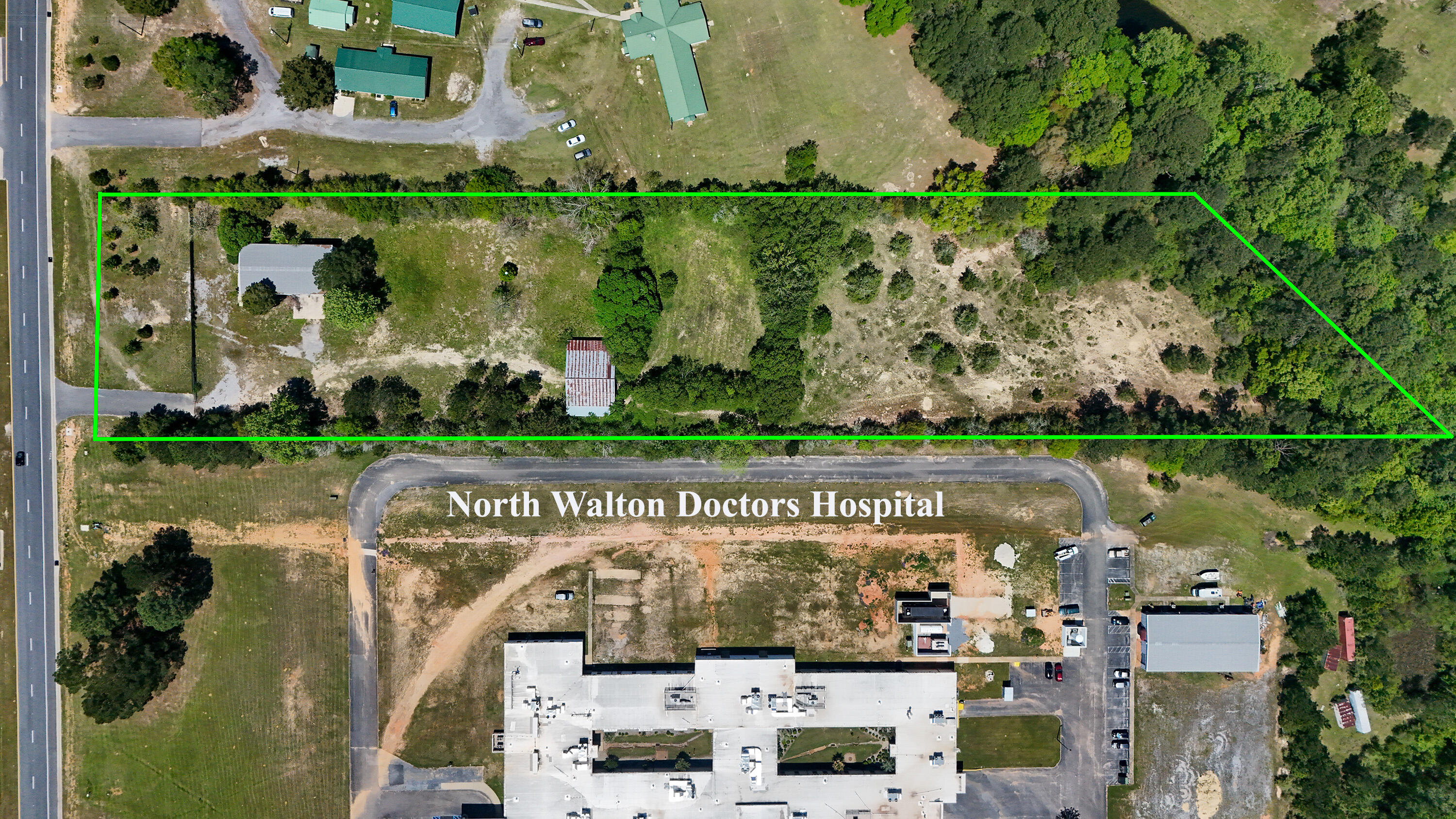 Prime 5-acre parcel with 200 front feet on Hwy 331S, ideally situated just south of I-10 and abutting North Walton Doctors Medical on the north side in DeFuniak Springs. Currently zoned Estate Residential, this property offers significant future upside as it borders commercial zoning, making rezoning a real possibility for a variety of uses. The site features a 4,000 sq ft warehouse, providing immediate utility for storage, distribution, or conversion to office or service space. The FDOT-reported traffic count is appx 23,000 vehicles per day for exceptional visibility. Adjacency to North Walton Doctors Hospital makes it especially attractive for ancillary medical services, clinics, therapy centers, professional offices, as well as other commercial ventures seeking high
exposure and