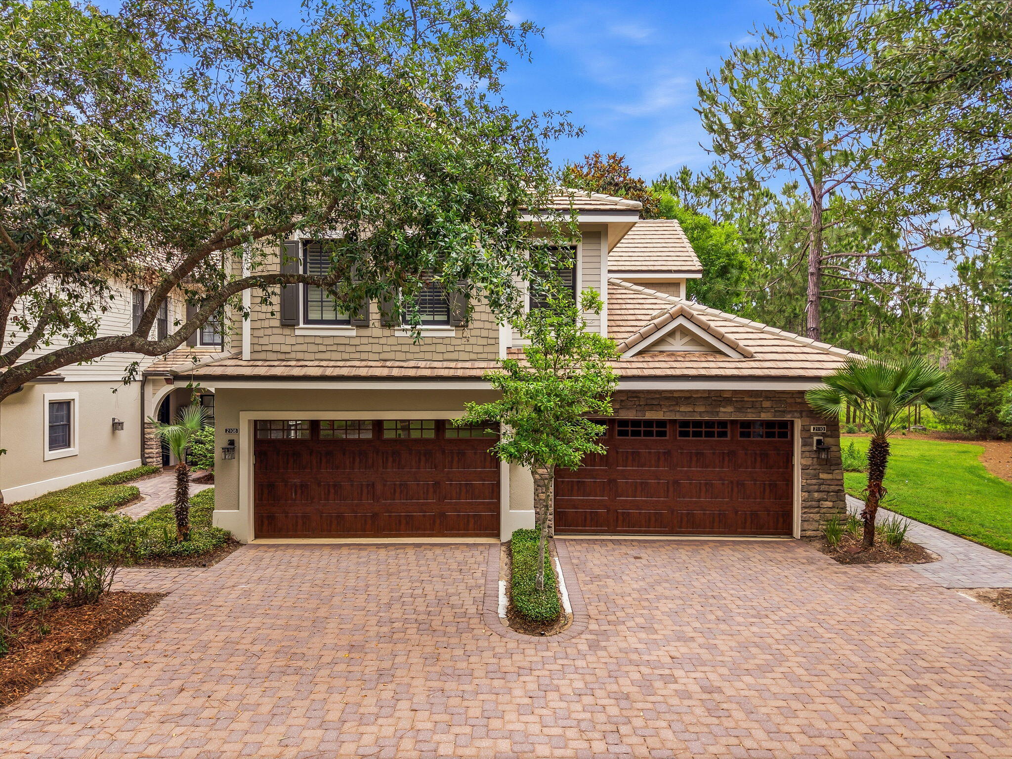 Welcome to refined coastal living in the exclusive Clubside section of Wild Heron. Perfectly situated right across from Sharks Tooth Clubhouse. This beautifully updated end-unit condo offers privacy, natural light, and stunning views overlooking the 9th hole of the award-winning Sharks Tooth Golf Course. Thoughtfully upgraded throughout, the residence features new LVP flooring, fresh interior paint, added lighting, a new HVAC system, and a new water heater for peace of mind and modern comfort.

The spacious kitchen opens to the living and dining areas, creating an inviting layout ideal for entertaining or relaxing after a day on the course. The primary suite serves as a private retreat with golf course views and a luxurious bath featuring a double vanity, soaking tub, and separate shower. Enjoy the serene setting, mature landscaping, and all the amenities Wild Heron is known for, including gated security, golf, resort-style pool, fitness center, and access to Lake Powell, Florida's largest coastal dune lake.

A rare opportunity to own an updated end unit in one of Wild Heron's most desirable sections.