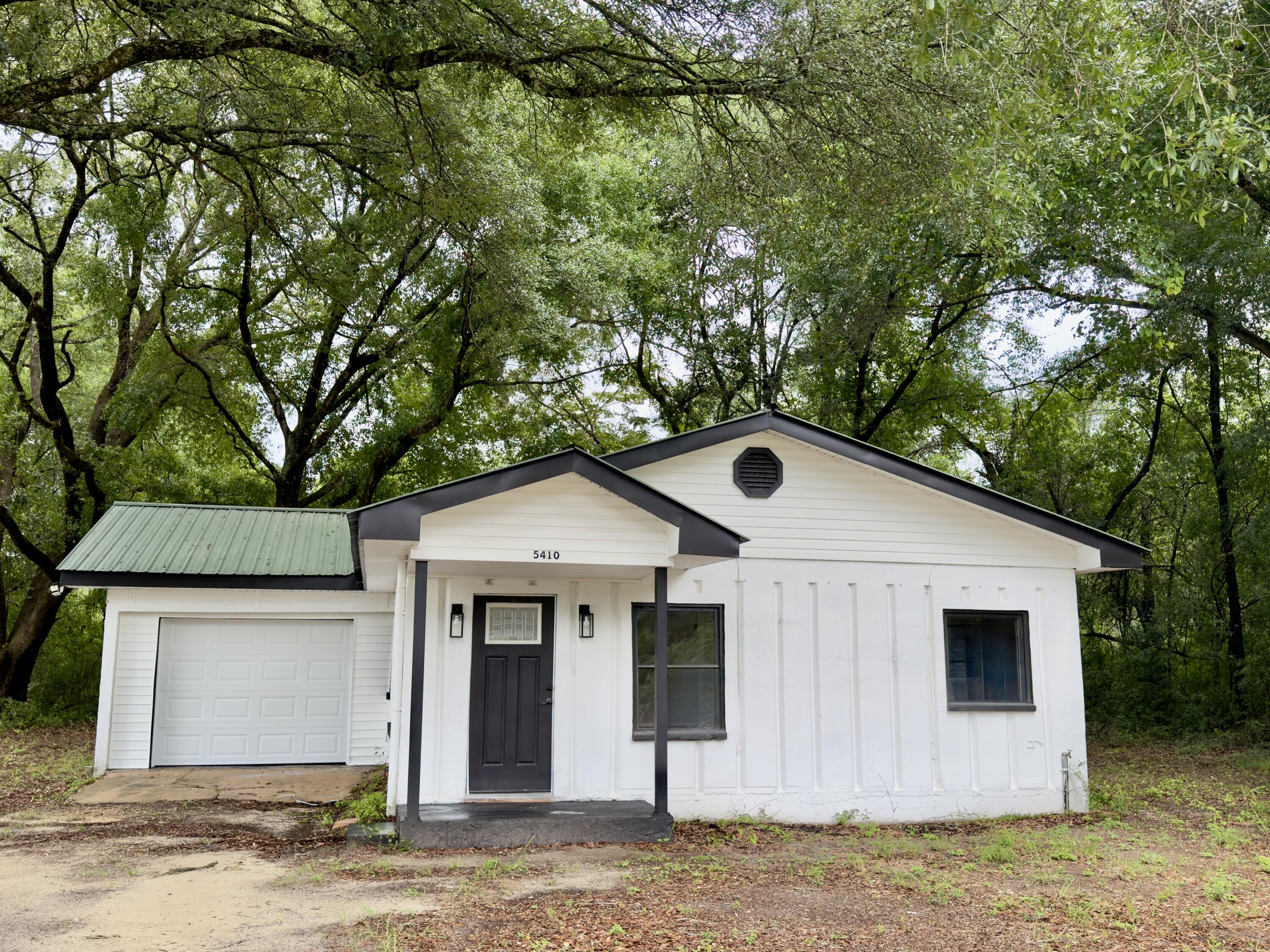 ***Seller now offering $5,000.00 anyway money at closing***

Welcome to 5410 Malcolm Tucker Rd, Crestview, FL 32536! This move-in-ready home offers a rare combination of durability and modern updates with solid concrete construction and extensive renovations completed in 2022. Major improvements include a new HVAC system, new kitchen appliances, updated lighting throughout, and a new electrical panel. A brand-new garage door was recently installed May 2026, adding to the home's appeal and functionality.
The solid concrete walls and ceilings provide exceptional strength, energy efficiency, and low-maintenance ownership. Inside, you'll find updated finishes and a functional layout ready for its next owner. Situated on a spacious lot, this property offers room to enjoy outdoor living while still being conveniently located near shopping, dining, schools, and all that Crestview has to offer.