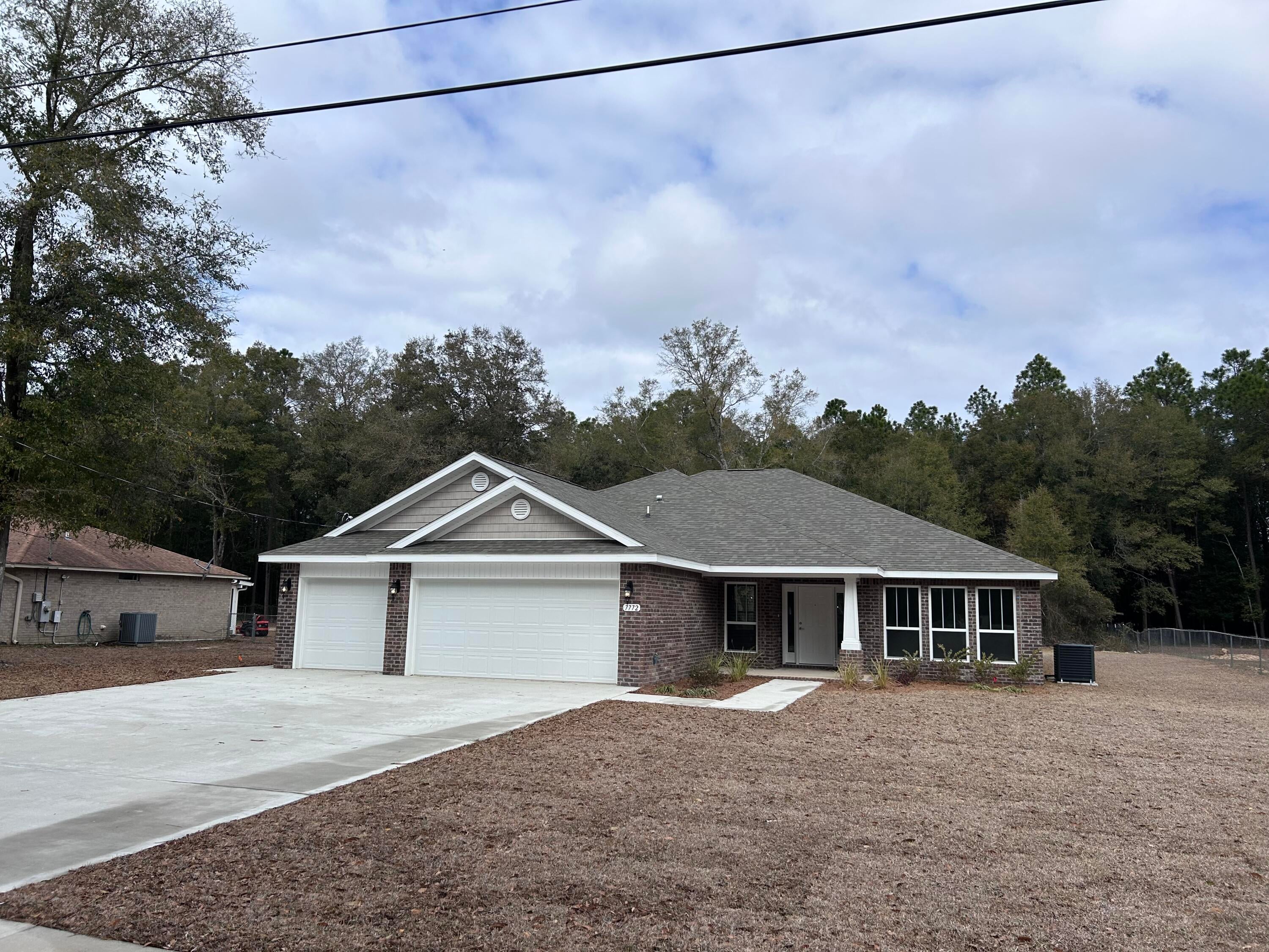 *Move In Ready New Construction on Large Lot *$15K Your Way on this home which can be allocated towards Interest Rate Buy Down, Closing Costs and/or Prepaid Items (certain restrictions apply) * This Plan Features: 2 x 6 Exterior Construction, 3 CAR GARAGE, 4BR/3BA & Morning Rm, Flex Rm, Dining & Breakfast Cafe * 10 Ft Ceilings & Laminate Wood Plank Flooring in Main Living Areas * Granite Countertops Kitchen & Baths * Tile Flooring in all Baths*  Kitchen: Granite Island, Stainless Steel Appliances & Walk In Pantry * Soft Close Cabinetry * Main Suite w/ Trey Ceiling & Main Bath with Builders Signature Zero Entry Walk in Tile shower w/ 2 Shower Heads, Separate Soaking Tub, Double Vanities & Large Walk-in Closets * Ceiling Fans All Bedrooms, Family Rm & Rear Covered Lanai * Irrigation & more.