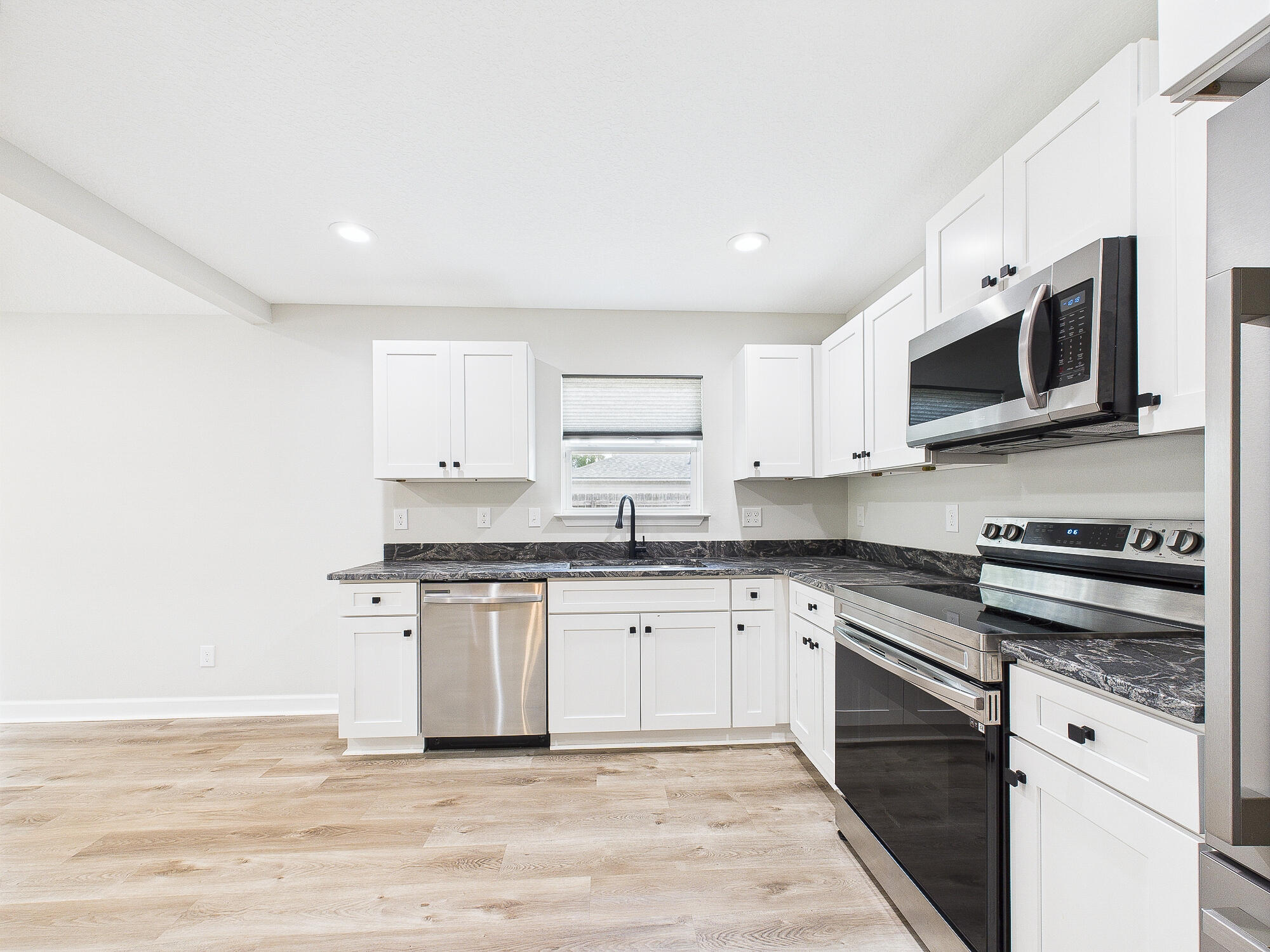 Assumable VA loan Aprox Bal 246K at 5.5% interest rate offers added value for qualified buyers.Like-new 3 bed, 2 bath home on a spacious 0.51-acre lot! Built in 2022, this 1,290 sq ft home features modern finishes throughout, including white shaker cabinets, granite countertops, and luxury vinyl plank flooring in the main areas. The open layout includes a walk-in pantry, a spacious master suite with walk-in closet, and plenty of natural light. Enjoy peaceful outdoor living with room to expand or entertain. Located in a quiet area with a country feel yet close to town. Schedule your tour today!