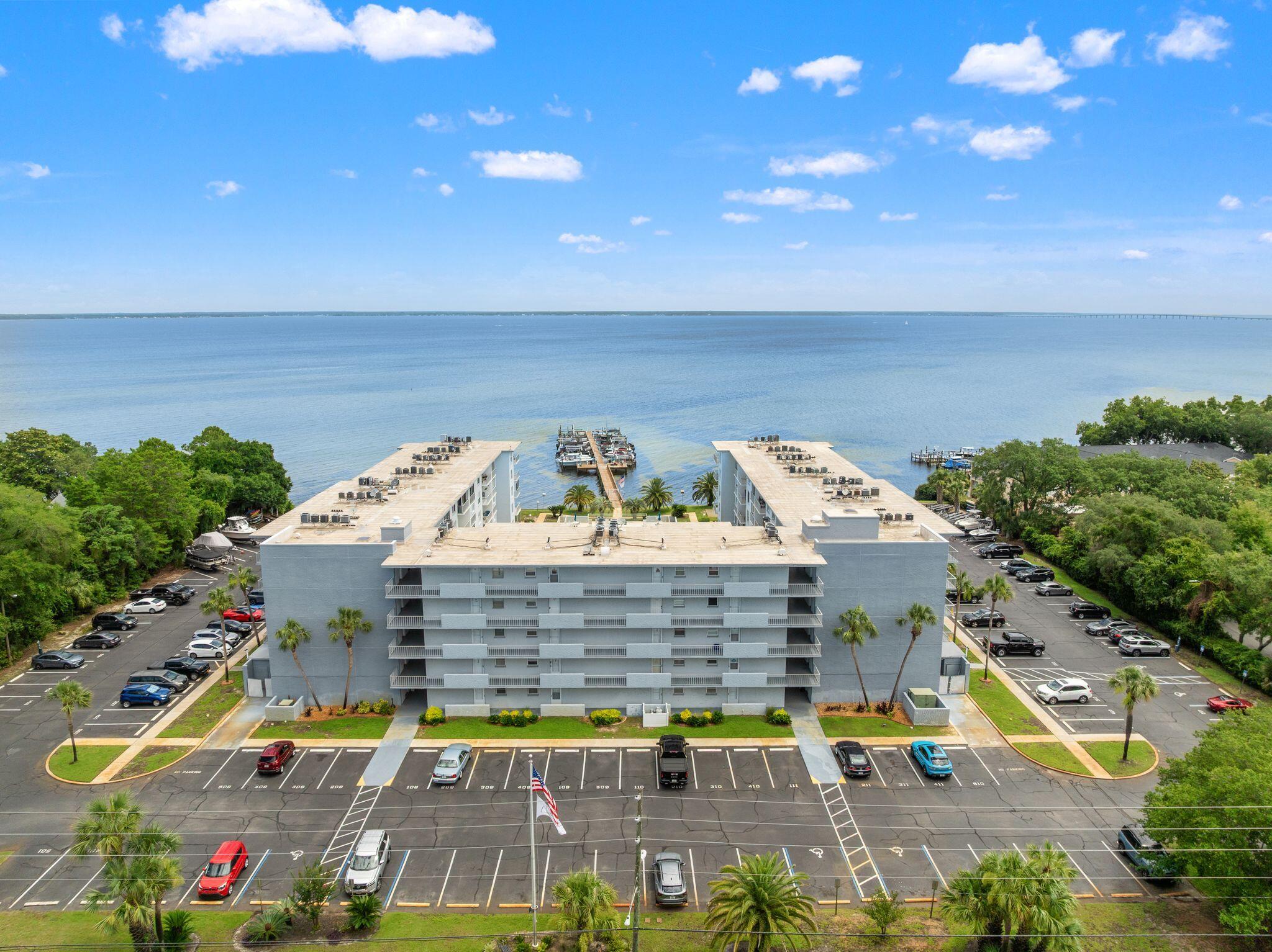 Destin living at its best! Nestled on the north side of Destin overlooking the beautiful Choctawhatchee Bay, Century Park Villas offers a peaceful waterfront lifestyle with a private marina and a unique sense of community. This desirable bayfront community provides the perfect blend of convenience, comfort, and coastal charm.            
This 4th-floor, 2-bedroom, 2-bath condo has been thoughtfully renovated with a 2024 remodel featuring updated kitchen appliances and countertops, refreshed bathrooms with new vanities and tiled showers, new LVP flooring, a new water heater, and freshly painted. The unit is offered with select furnishings, ideal for a full-time residence, second home, or coastal retreat. Century Park Villas is a quiet, well-maintained community with no short-term rentals (6-month minimum lease requirement). Residents enjoy a variety of amenities including a large community pool, clubhouse, fishing from the community dock, picnic area, fishing station, same-floor laundry and storage, and an on-site management company.

Located in the heart of Destin, this condo offers easy access to world-class beaches, dining, shopping, and everything the Emerald Coast has to offer. Whether you're looking for a primary residence, second home, or a peaceful coastal getaway, this property offers an exceptional opportunity to enjoy the Destin lifestyle.