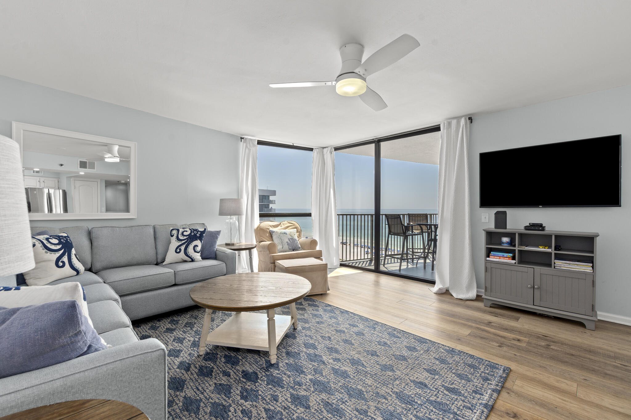 Experience breathtaking Gulf views from this tastefully updated 7th floor Gulf front condo in the gated beachfront community of Mainsail in Miramar Beach. Offered fully furnished, this coastal retreat showcases the beauty of the Emerald Coast from the private balcony, living area, and primary suite. The inviting interior features luxury vinyl plank flooring, granite countertops, an updated kitchen, updated baths, and an open living and dining area designed to maximize natural light and stunning beach views. The primary suite offers direct balcony access, creating the perfect place to unwind after a day on the sugar white sand beaches. Situated on more than 15 acres of Gulf front property, Mainsail offers private beach access, pools, hot tubs, fitness center, grilling areas, and beautifully maintained grounds. Short term rentals are permitted, making this an outstanding vacation home, second home, or investment opportunity. Ideally located in the heart of Miramar Beach, directly across from Silver Sands Premium Outlets and just minutes from Grand Boulevard, Baytowne Wharf, Destin, and Scenic Highway 30A. Sold fully furnished and rental ready. Features include an interior owner's closet, exterior owner's storage closet, and an in unit washer and dryer. Located in highly desirable Building 2, one of Mainsail's Gulf front towers. Ample owner and guest parking available. Short term rentals permitted.