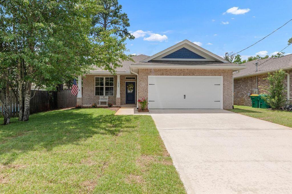 BETTER THAN NEW!  NO Association here!  Room for a POOL!  ALL Brick.  All Brick, open floor plan, 4 bedrooms and 2 bathrooms. in the center of Niceville.  As you walk into your beautiful home, you see your dining room and kitchen, with modern light fixtures and recessed lighting.  The warm kitchen cabinets, granite counter tops, and sizeable bar are perfect for entertaining, or for just enjoying family meals.  The large family room has trayed ceiling, and opens to a large, covered patio in a fully fenced oasis.  The storage building is perfect for storing lawn care items while your children play on the swing set.  French drain has been installed by the sellers, preventing any settling water.  An expansive master suite features trayed ceilings, a large walk-in closet, and an ensuite with a walk-in shower, double vanities, and a linen closet.  A distinct hallway off the main living area accessed three additional bedrooms, and a shared full bath with double sinks.