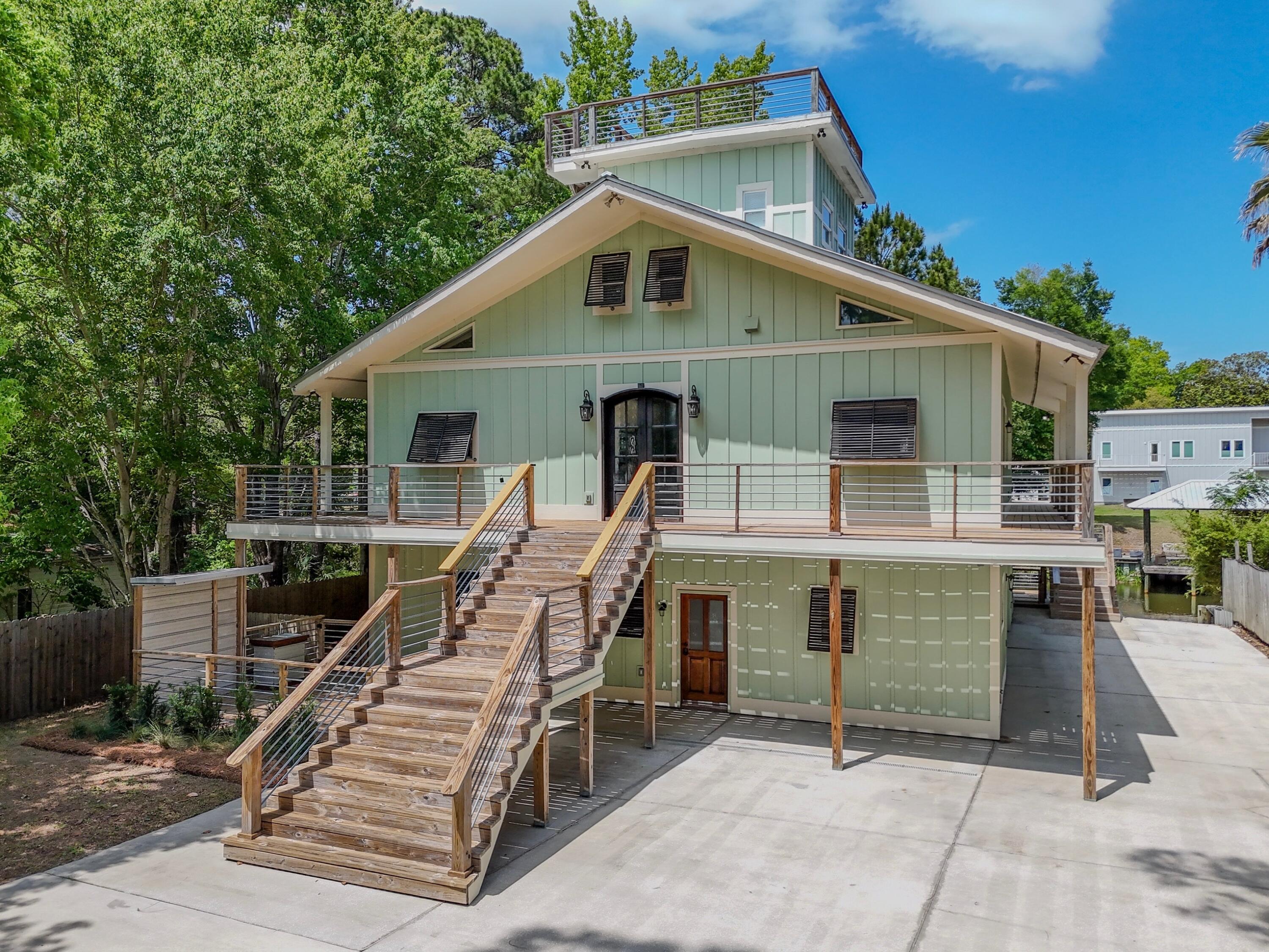 One-of-a-kind waterfront retreat in Point Washington offering 3,860 square feet of flexible coastal living. This 5-bedroom, 5-bath home is thoughtfully designed across multiple levels, creating the perfect setup for a primary residence, multi-generational living arrangement, or vacation rental/AirBnb investment. The lower level features two separate spaces including a private 2-bedroom, 2-bath in-law suite with a full kitchen and dining area, along with a separate game room, kitchenette, full bath and access to the pool and rear deck. The middle level offers an additional 2-bedroom, 2-bath suite with office space, living area, and full kitchen finished out with brand new high end stainless appliances, while the top level lookout loft provides elevated views and added flex space full of character. The lookout loft also features an outdoor wet bar perfect for entertaining guests. Outside, enjoy an in-ground pool,
private dock, 2-car garage, private boat launch, and multiple outdoor living spaces in both the front and rear of the home designed to maximize the peaceful waterfront setting. Surrounded by mature trees and located just minutes from 30A beaches, dining, shopping, and outdoor recreation, this distinctive coastal property offers privacy, versatility, and endless potential. Call and schedule your private showing today.