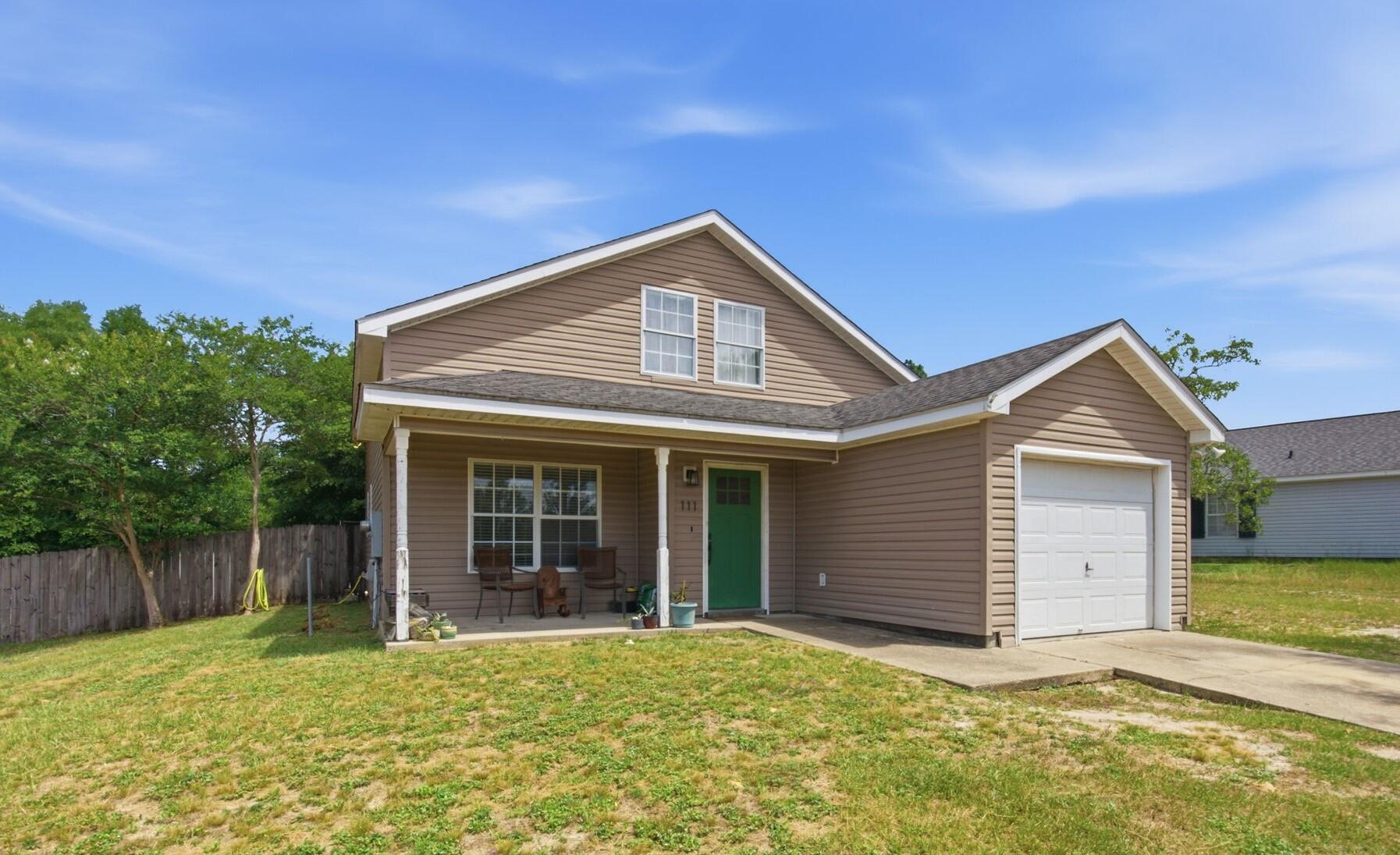 Charming 4-bedroom, 2-bath home in Timber Wind Estates, conveniently located within the DeFuniak Springs city limits with no HOA. Offering over 1,500 square feet of living space, this move-in-ready home features a functional floor plan and a spacious fenced backyard with rear gate access, providing plenty of room for your boat or RV. Perfect for first-time homebuyers or growing families, the home is approximately one mile from A+ schools and less than a quarter mile from Lake Stanley Park, where you can enjoy swimming, fishing, and boating. Plus, the beautiful white-sand beaches of 30A are just a short drive away.