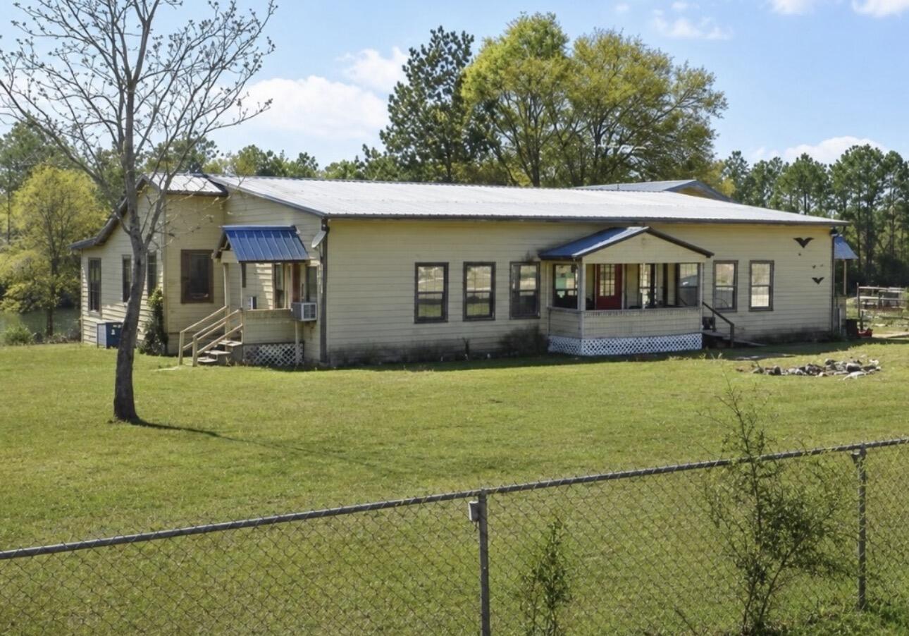 Welcome to this spacious property offering over 3,100 + square feet of living space situated on two waterfront lots, providing plenty of room to enjoy the peaceful setting. The main home features 5 bedrooms and 3 bathrooms, along with a private 1-bedroom, 1-bath apartment....perfect for extended family, guests, a home office, or multi-generational living.

Major updates have already been completed, including a 6-ton HVAC system, PEX plumbing, updated electrical, new subfloors, updated ductwork, new water heater, a remodeled kitchen, renovated bathrooms, and roof improvements. Additional features include an attached 2-car garage, carport, storage shed, and ample parking for vehicles, boats, or recreational equipment.

With many of the major systems already updated, this property offers an excellent opportunity for the next owner to add their own cosmetic touches and make it their own. CASH only please and is sold AS IS