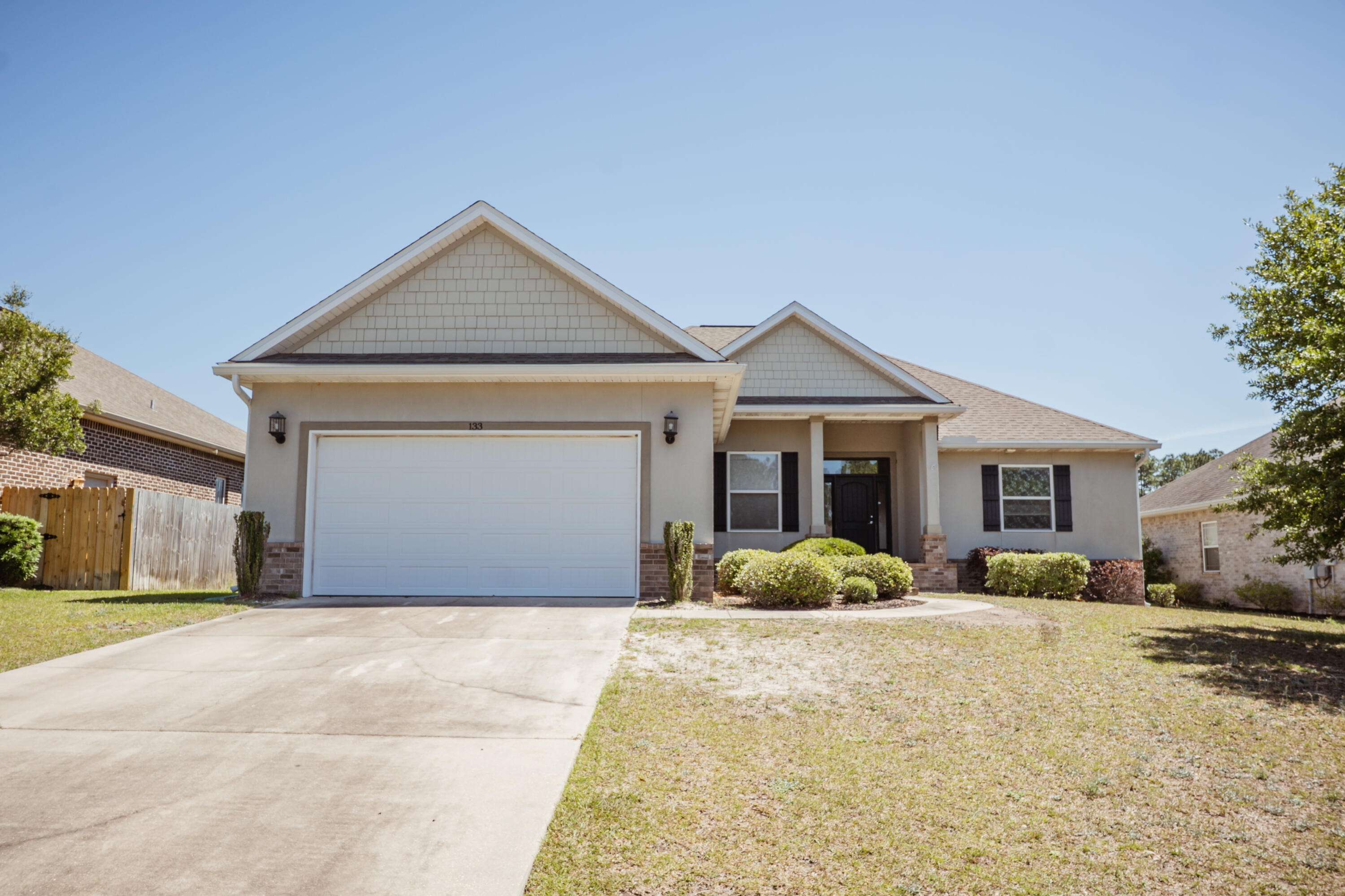 Available Now!!!  Fantastic South Crestview home with easy access to bases, beaches and shopping.  New carpet and new paint featured in this 4/2 floor plan custom home.  Maple hardwood floors, 10 ft ceilings throughout the home, open concept floor plan with kitchen island, custom finishes, eat in kitchen area and newer appliances. 
 Spacious bedrooms and walk in closets. 
 Amazing master bathroom and large guest.  2 Car garage, privacy fenced back yard and pet friendly with owner approval and non-refundable pet fee. No inside smoking or vaping.