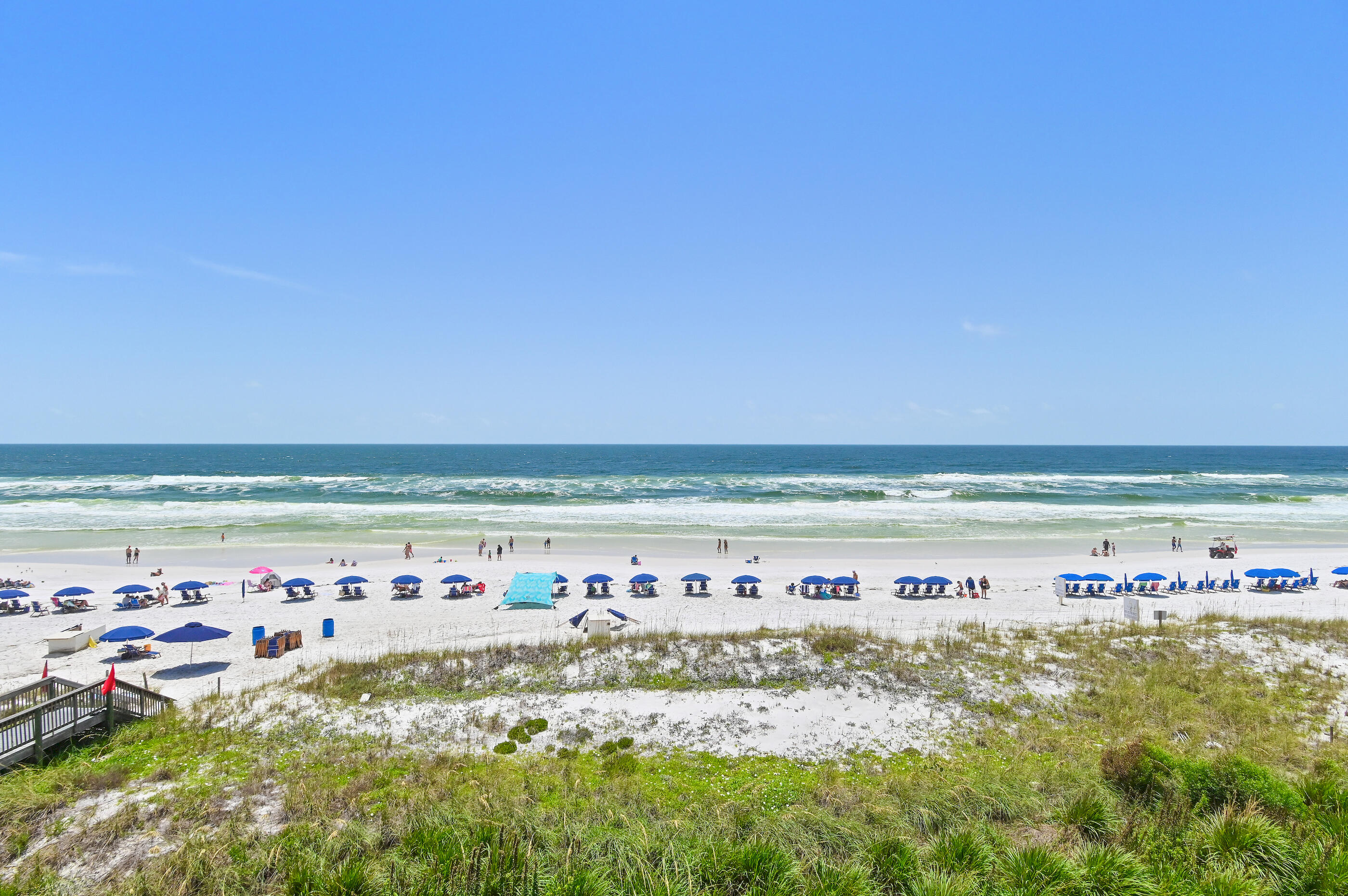 Completely reimagined from top to bottom, this stunning Gulf-front residence offers the perfect blend of luxury, style, and coastal living. Featuring 2 bedrooms, 2 bathrooms, and a versatile loft, this two-story unit has undergone a total renovation with no detail overlooked and no expense spared.

Every surface has been thoughtfully updated, including custom wide-plank tile flooring, quartz countertops, new cabinetry, appliances, fixtures, interior doors, trim, designer tile showers, and a custom backsplash. The result is a fresh, sophisticated coastal retreat that feels brand new.

Enjoy breathtaking waterfront views from private balconies on both levels, or take in the Gulf breezes from the rooftop sun terrace located just off the primary suite. This unique outdoor space provides the perfect setting for morning coffee, evening sunsets, or simply relaxing above it all.

Located in a low-density, three-story Gulf-front building, owners enjoy the convenience of covered parking, elevator access, and a more private beach experience. With its exceptional finishes, prime waterfront location, and attractive price point, this is one of the best values available along the coast.